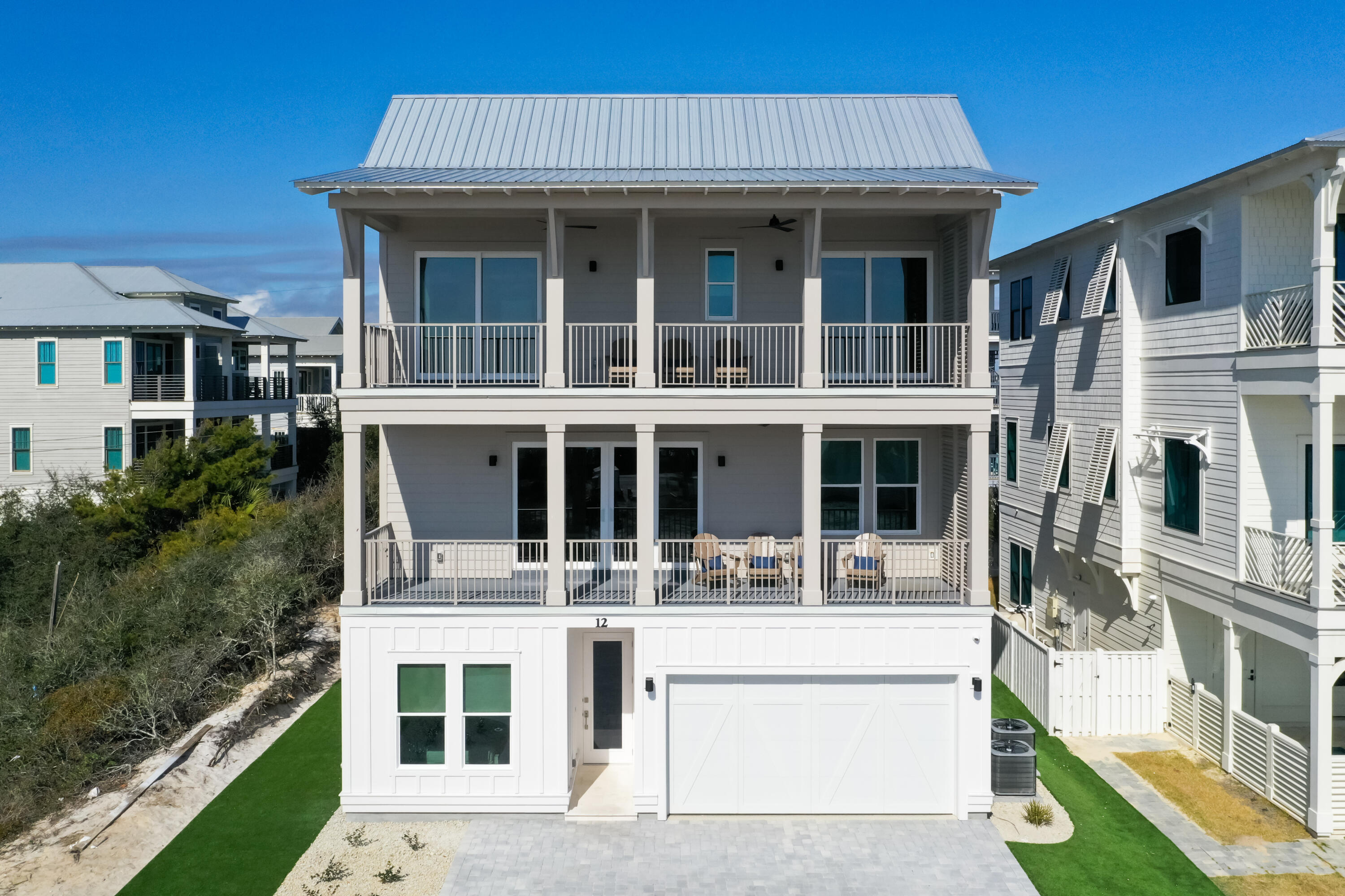 Offering a Watersound Beach Club Membership with acceptable offer!

Completed in 2025, fully furnished and thoughtfully positioned just steps from the Gulf, 12 Jan Court presents a refined coastal residence where modern design and enduring craftsmanship converge. Offering 4,138 square feet, six bedrooms, and seven and a half baths, this home is curated for both elevated living and exceptional flexibility. The first level is designed as an entertainment-focused retreat, seamlessly connected to the outdoor pool and ideal for hosting and relaxation. Above, the primary living and kitchen level is defined by clean architectural lines, floor-to-ceiling cabinetry, and expansive windows that frame Gulf views and fill the home with natural light. This open-concept space flows effortlessly between culinary, dining, and gathering areas, creating a refined yet inviting atmosphere. A wet bar enhances the home's entertaining appeal, while the in-home elevator provides seamless access to every level.

Private retreats are thoughtfully arranged, including custom-built bunk beds and generous bedroom suites designed for comfort and privacy. Outdoors, a private pool offers a tranquil setting for relaxation, complemented by a two-car garage and ample storage for coastal living.

Three beach access points just beyond the doorstep, while the shops and dining of Rosemary Beach and 30Avenue are within easy walking distance. With no HOA and a projected $250,000 rental guarantee for 2026, the property offers both lifestyle appeal and long-term opportunity.

Defined by its recent construction, thoughtful details, and premier location, 12 Jan Court delivers a sophisticated expression of life along 30A where design, proximity, and possibility align in remarkable fashion.