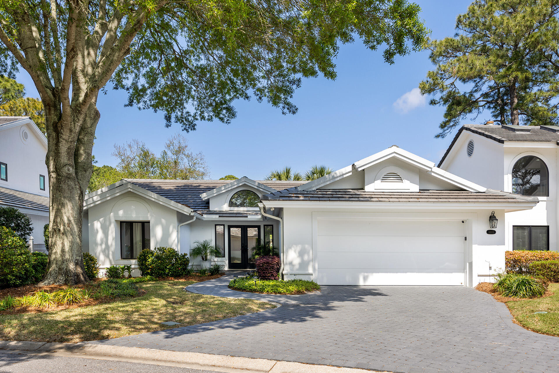 Nestled on a quiet cul-de-sac along a private, no-outlet street, this beautifully updated home offers sweeping, unobstructed views of the 9th fairway of Baytowne Golf Course, along with a serene lake and charming footbridge backdrop. Located in the highly desirable, rental-restricted St. Andrews neighborhood within Sandestin Golf and Beach Resort, this property combines privacy, elegance, and resort-style living. The Sandestin Resort boasts more than seven miles of sugar-white sand beach and bayfront property, four championship golf courses, 15 world-class tennis courts, 6 pickleball courts, access to 4 resort swimming pools, a 123-slip marina, water sports, children's programs, a fitness center and spa, 65,000 square feet of meeting space and The Village of Baytowne Wharf a pedestrian village featuring a host of boutique shops, casual and fine dining restaurants, nightclubs and bars that come alive with strolling musicians, street performers, dancing fountains and lively festivals and events. Everything within the resort's gates is accessible by golf cart or bicycle.