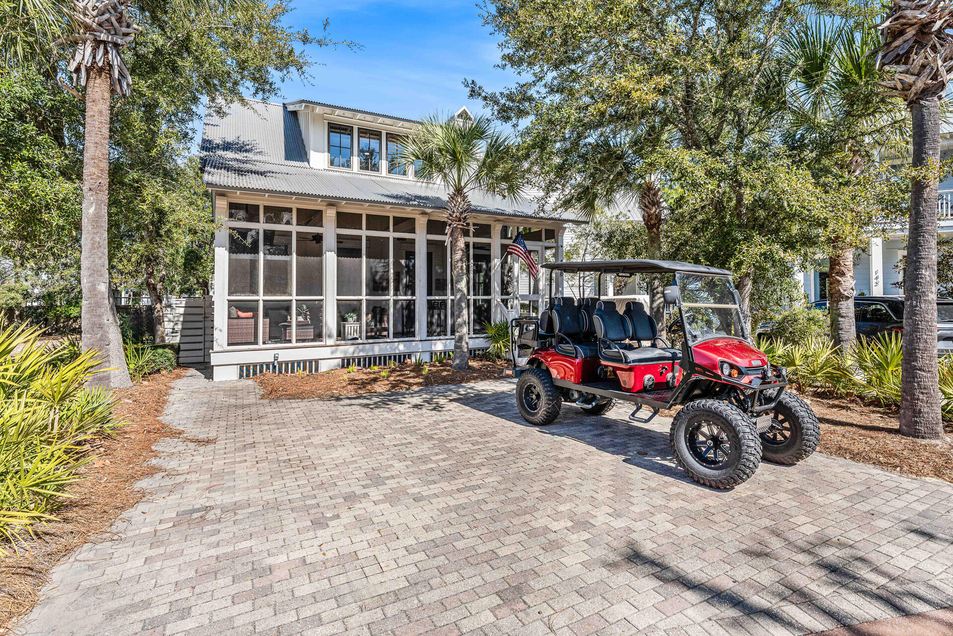 Located in the highly sought-after gated community of Cypress Dunes along Scenic Hwy 30A, 148 Cypress Walk presents an outstanding opportunity for investors, second-home buyers, or those seeking strong short-term rental potential in Santa Rosa Beach, Florida. This beautifully designed 3-bedroom, 3.5-bath coastal residence offers 1,957 square feet of thoughtfully designed living space with a highly desirable open-concept floor plan ideal for entertaining and guest accommodations.

A full-width screened front porch creates inviting outdoor living space with peaceful views of the quiet tree-lined street--perfect for relaxing after a day at the beach or hosting guests year-round. Inside, the bright and airy living and dining areas feature abundant natural light, hardwood flooring, and a classic white fireplace with gas fire, delivering timeless coastal charm.

The well-appointed kitchen is designed for both everyday functionality and vacation living, featuring granite countertops, stainless steel appliances, and a spacious center island that seamlessly connects the main living areas. With its prime 30A location, strong rental appeal, and access to the exceptional amenities of Cypress Dunes, this seller-motivated property offers incredible value and investment potential along the Emerald Coast. Designed for effortless coastal living, the first-floor primary suite offers privacy and convenience with direct porch access, allowing seamless indoor-outdoor living on the main level without constantly navigating stairs. Upstairs you'll find two additional bedrooms, each with its own bath, along with a versatile loft space perfect for a home office, reading nook, or additional sleeping area. The home's light-filled design creates a relaxed coastal feel throughout, making it a welcoming retreat for both owners and guests.

Located within the gated Cypress Dunes community on 30A, residents enjoy resort-style amenities including a stunning Gulf-view infinity pool with spa, a two-level clubhouse, fitness center, tennis courts, and a scenic boardwalk bridge crossing the community's namesake cypress lake. The neighborhood is known for its friendly atmosphere, with regular gatherings and events at the amenity center that bring neighbors together.

This property also presents a lucrative short-term vacation rental opportunity, benefiting from strong guest demand within the Cypress Dunes community and its prime location along Scenic Highway 30A. Ideally positioned in Santa Rosa Beach, the home offers convenient access to some of the area's most popular restaurants, Gulf beaches, and outdoor recreation while remaining tucked away from heavy traffic. Residents and guests enjoy daily walks to the beach, exploring the nearby cypress forest trails, and easy access to Topsail Hill Preserve State Park, making this an ideal coastal retreat for both personal enjoyment and investment potential.

What owners love most is how effortlessly the home captures the relaxed 30A coastal lifestyle--whether enjoying morning coffee on the porch, afternoons at the beach, or evenings watching the sunset with friends and family. With its prime location, strong rental performance, and welcoming community setting, 148 Cypress Walk offers an exceptional opportunity for a primary residence, second home, or high-performing investment property in Santa Rosa Beach.

Recent Improvements & Upgrades by Owner Include:
Extensive updates and enhancements have been completed since ownership, including a completely rebuilt fireplace with brick masonry, new flue, chimney cap, and gas log set with wall switch start. The home also features an on-demand gas water heater, updated kitchen appliances including refrigerator, stove, microwave, oven, and additional beverage refrigerator, along with a newer washer and dryer (approximately one year old). The primary suite has been enhanced with updated shower plumbing and a custom-built primary closet system.

Additional improvements include a newly added office space off the kitchen, custom shelving and pantry upgrades with tiled flooring, new window coverings in the office, and updated LED lighting throughout the home. Outdoor upgrades include irrigation for flower pots, screened enclosure beneath the home to prevent critters, an outdoor shower with enclosure, storage shed, and dedicated trash enclosure. The driveway has been extended with additional parking and sidewalks added along both sides of the home. Additional exterior enhancements include new wood steps at the front and side entrances, added porch lighting and ceiling fans, a TV on the screened porch, and exterior paint completed in 2024 with interior paint completed in 2022. There are newly added security cameras, remote locks and remote lighting. The home is also being offered furnished with all new updated TVs, bedding, and household items, making it move-in or rental ready.