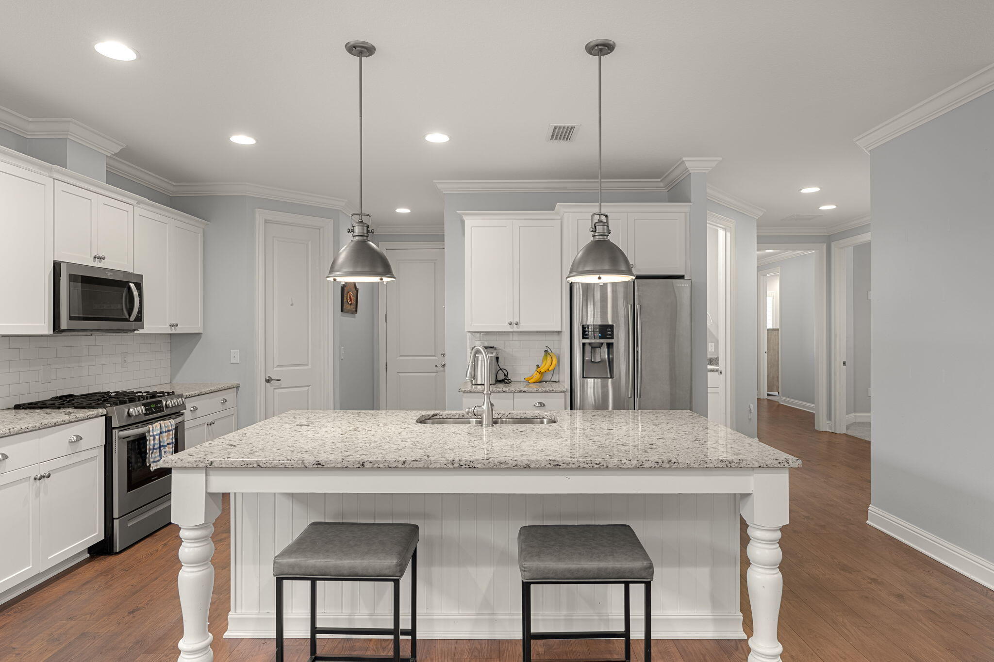 Come check out this custom-built Randy Wise home featuring a home warranty,  open floorplan that is great for family gatherings and entertaining. The Kitchen has stainless steel appliances including a gas stove/oven, 42'' cabinets, granite counter tops with a butler's pantry. A large kitchen island and built-in dining room bench with storage. 

Both the family room and primary bedroom feature custom cabinetry with shelving and fireplaces. The primary bedroom has a beautiful en-suite bathroom with a soaker tub, walk-in shower, double vanity and two walk-in closets. There are two additional bedrooms with connecting bath and a flex/office room that also features custom bookcase with shelving and credenza. Plantations shutters throughout, 9-foot ceilings with 8' doors, custom built-ins ... a Rinnai tankless water heater, crown molding, encased windows and doors, high-end porcelain tile in wet areas, and an upgraded HVAC system with an infrared and mold-killing system. An oversized 2 car garage with new garage door opener and a pull-down attic for storage. Outside you'll find a large, fenced, in yard with a programmable irrigation system and new irrigation pump.

Hammock Bay is only 19 miles to the world famous 30A beaches with dining and a thriving music scene. Hammock Bay has three clubhouses, multiple pools which includes a lap pool for active swimmers, Windmills Town Center with a grocery store, Props Brewery and food truck court, two 24/7 fitness centers, pickle ball courts, miles of walking and bike trails, Canine Commons, Playgrounds, Sports Complex. The bayfront clubhouse and dock provide direct access to Choctawhatchee Bay, perfect for enjoying sunsets, kayaking, fishing, or simply taking in the waterfront views. If you have not been to Hammock Bay you have to come take a tour of this amazing planned community! Buyer to verify square footage, lot dimensions and all information deemed important to them.