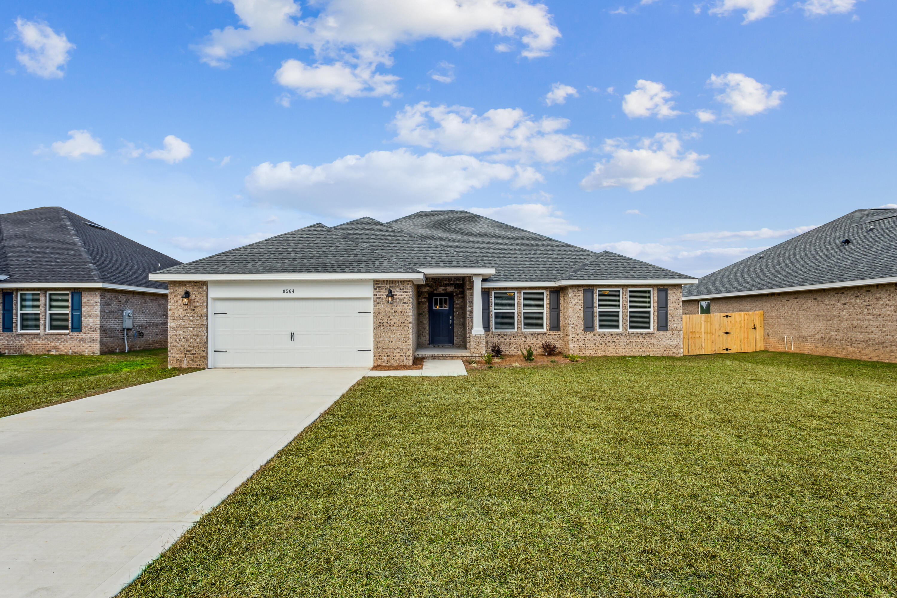 New construction in Buckeyes Landing! The Liberty is a spacious 4-bedroom, 2-bath home featuring an open layout and modern finishes throughout. The kitchen offers stainless steel appliances, granite or quartz countertops, slow-close cabinetry, an island, and a large pantry. The split floor plan provides added privacy, with the primary suite including tray ceilings, double vanities, a tiled walk-in shower, and a garden tub. The fourth bedroom offers flexibility as an office or playroom. Crown molding accents the main living areas, and blinds are included.
Buckeyes Landing is ideally situated in the heart of Navarre. The neighborhood is located off Bob Tolbert Road, providing convenient access to major routes including US-98 and State Road 87 for easy commuting east toward Destin or west toward Pensacola. Just minutes from local amenities - including shopping, restaurants, parks, highly rated schools, and world class beaches. 
Projected completion is July 2026.