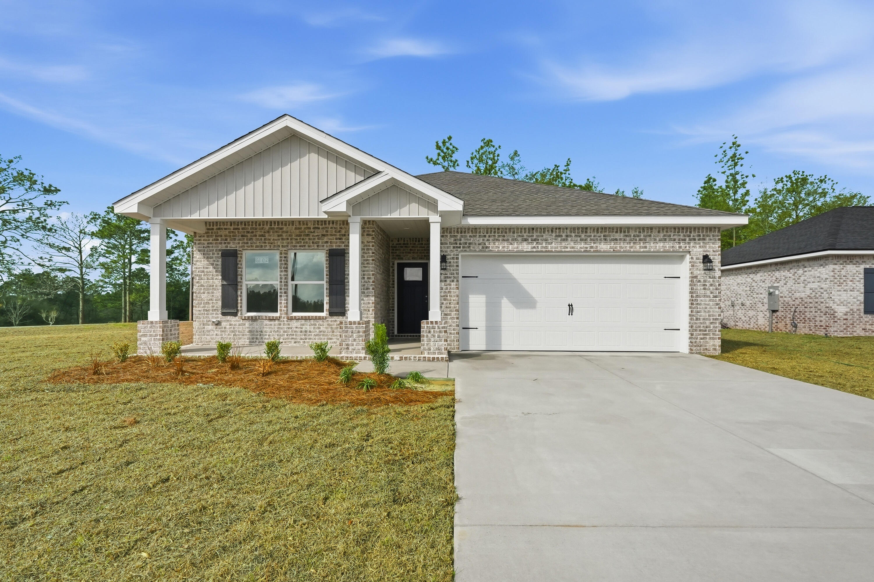 SOUTHERN CHARM - Maybell I floor plan. All brick construction, fully landscaped yard, completed garage, no HOA, low county taxes. Seller will contribute up to $15,000 towards closing costs and/or prepaids and/or rate buydown (restrictions apply) PLUS FREE BLINDS & REFRIGERATOR Functional floor plan features foyer opening to family room, which overlooks kitchen and cozy dining nook. Work island w/bar seating, corner pantry, quartz countertops. Luxury vinyl plank flooring in common areas. Owner's bath has double vanities, linen storage + walk-in closet, and split bedroom design. Ceiling fans thru-out, recessed lighting, carpet in bedrooms. Front and rear porches for relaxing. Call to see today.