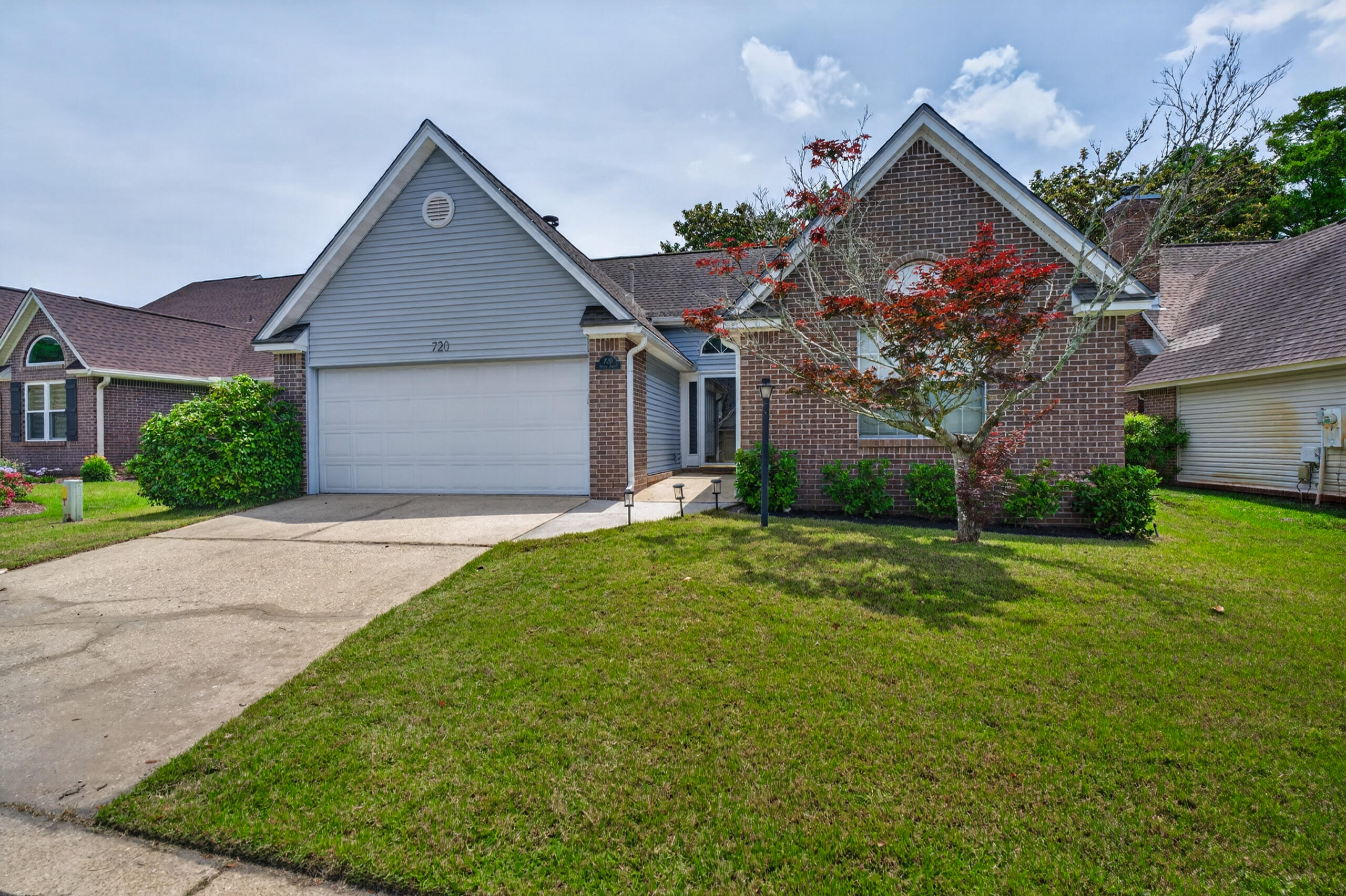 Located in the highly sought-after Fairway Lakes community of Bluewater Bay, this charming 3-bedroom, 2-bath home offers the perfect blend of comfort, convenience, and lifestyle. Nestled within a quiet two-street neighborhood adjacent to the Bluewater Bay Golf Club and tennis facilities, residents enjoy easy access to scenic walking paths and outdoor recreation.

Step inside to discover a spacious living area featuring vaulted ceilings, brand new LVP flooring, abundant natural light, and a cozy fireplace--perfect for relaxing or entertaining. The thoughtfully designed floor plan provides seamless access from the kitchen, Florida room, and primary suite to the screened-in private pool area, creating an ideal indoor-outdoor living experience. The oversized primary suite includes a walk-in closet and a fully remodeled en suite with new shower and vanity. Conveniently located just minutes from Niceville, approximately 15 minutes from the white sand beaches of Destin, and less than 30 minutes to Eglin Air Force Base, this home combines peaceful neighborhood living with quick access to the area's top destinations.