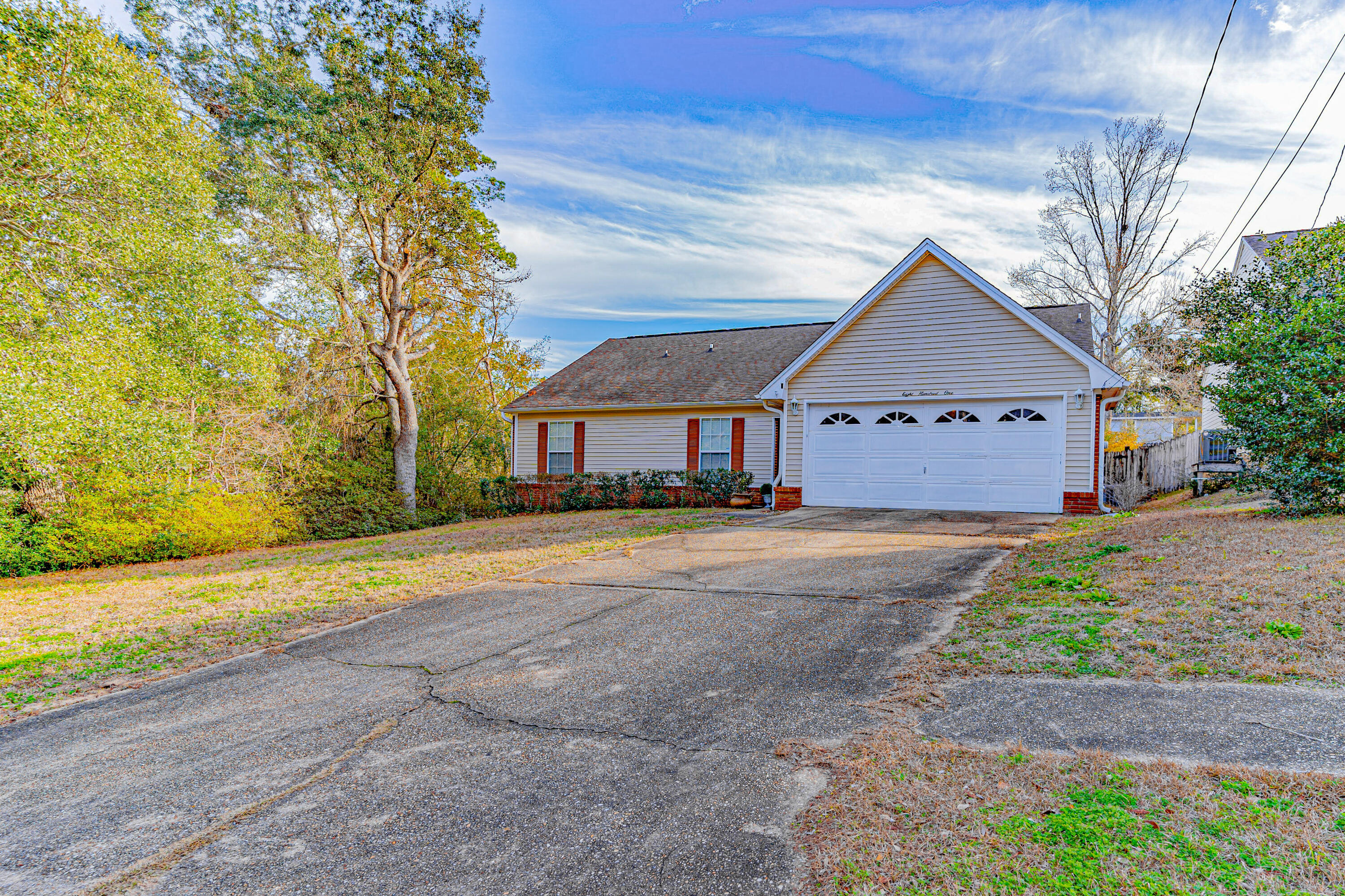 Seller said SELL! New roof with acceptable offer! Plus, the seller is offering an included 1-Year Home Warranty to the buyer for peace of mind. 
Location, location, location! Situated on a cul-de-sac in Niceville, FL, this lovely 4-bedroom, 3 and 1/4 bath home is within a few miles to Eglin AFB, Destin/FWB Airport, Turkey Creek Nature Trail, HCA Hospital, Walmart, and so much more. It's hard to beat the convenience of this location. Perched on a hill, the home itself features all kinds of outstanding upgrades. This inviting residence offers 1750sqft of comfortable living space with 3 bedrooms downstairs and another bedroom with full bath upstairs. The kitchen features newer appliances, including an LG refrigerator with dual ice makers, a brand-new Whirlpool dishwasher, wine cooler, and a built-in microwave. Enjoy clean drinking water with the reverse osmosis system, thoughtfully connected to the kitchen sink, refrigerator, and directly to the coffee pot. There is a high-end exhaust hood over the gas stove. The laundry room features a stackable washer and gas dryer that remains with the home. This home goes beyond the basics with a Simplisafe alarm system; including cameras for added security and peace of mind. There are many lights on motion sensors throughout the home, lighting your way in areas like the kitchen, walk-in closet, and primary bath. Speaking of the primary bath... WOW! The frameless glass shower with rainfall head, tile to the ceiling, and heat lamps provide a luxurious experience and the wrap-around double vanity with recessed medicine cabinets add to convenience. The yard features a patio area that is great for grilling as well as a privacy fence and WiFi enabled lawn sprinklers. There are also two kumquat trees and a lime plant, adding a touch of Florida flavor to this exceptional home. Schedule your showing today!