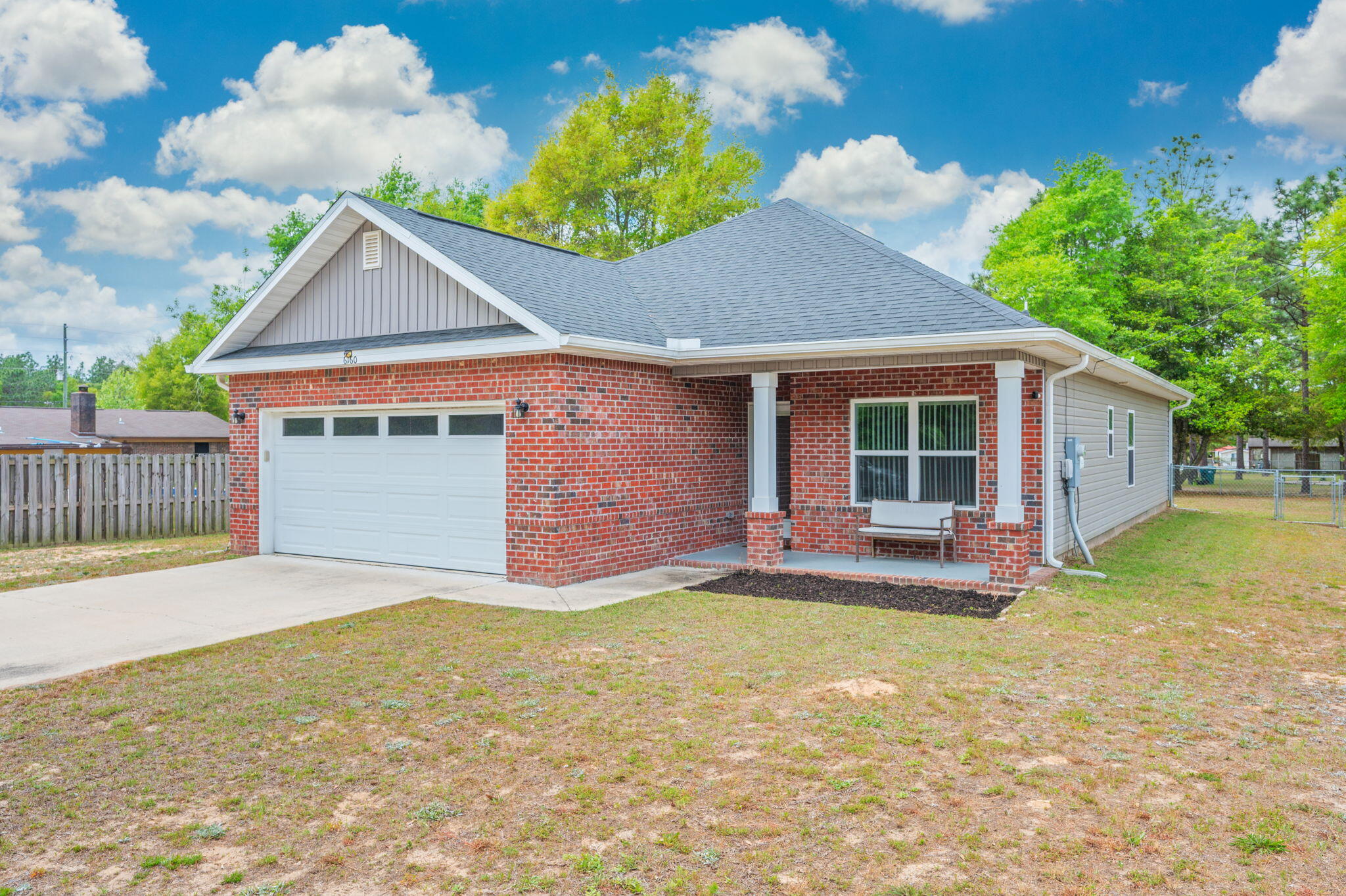 No HOA and move-in ready! This well-maintained 3 bedroom 2 bathroom Crestview home offers an open layout with luxury vinyl plank flooring throughout--no carpet.The kitchen features granite countertops and flows seamlessly into the main living area, creating a functional space for everyday living and entertaining. Granite countertops continue into the bathrooms for a consistent, upgraded finish. All major appliances are included--refrigerator, dishwasher, microwave, washer, and dryer--making your move simple and convenient. Enjoy outdoor living with a covered front porch and covered back patio, plus a large, fully fenced backyard with plenty of space to use as you choose. The home also includes a spacious driveway and 2-car garage for ample parking.