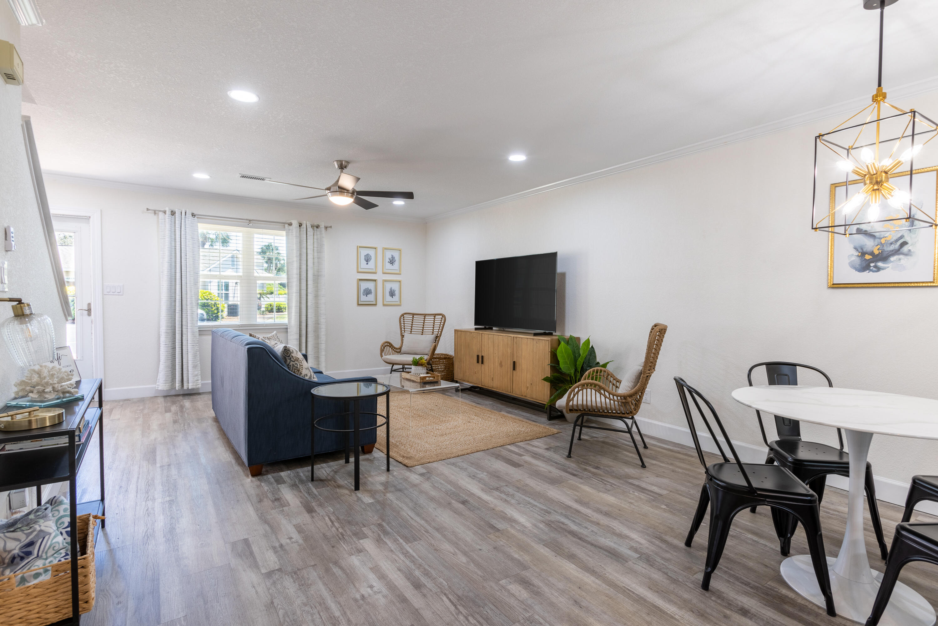 This is the lowest price townhome you'll find in Woodland Shores, one of the nicest units and SELLER is MOTIVATED!  Welcome to your own slice of paradise in Woodland Shores, nestled along the Emerald Coast, one of the most coveted shorelines with its white sugary sands and emerald green waters.  This newly renovated 2-story townhome in Miramar Beach offers the perfect retreat within walking distance (just 2 blocks) to the beach and is being sold fully-furnished!  
With 2 bedrooms, 2.5 bathrooms, and 1296 sq ft, there's plenty of space to live a life by the coast with shopping, entertainment, and attractions nearby. Use as a primary residence, vacation getaway or investment property (short-term and long-term rentals allowed here).  The possibilities are endless.  GRI - 2024/$30,332 and 2023/$30,499.  

Step into your dream kitchen with stainless steel appliances, upgraded countertops, backsplash and designer-themed fixtures and finishes and a full-sized washer and dryer.  Relax at your breakfast bar with coffee in hand with beautifully crafted pendant lighting hanging above.  You'll find newly renovated LVP flooring all throughout the home.  Upgraded lit ceiling fans keep electric costs low and help keep that ocean breeze flowing throughout the home.  Your living room has a 1/2 bath nearby with plenty of space for entertaining and family get-togethers.  

Retreat to your primary bedroom large enough for a sitting area and a covered balcony right outside your glass doors.  Step into your ensuite bathroom with dual vanities and a gorgeous updated shower. 

For your guests, you can provide their own retreat as they step into their own bedroom with private guest ensuite bathroom, all upgraded with the most beautiful fixtures and finishes, creating a seamless blended look of matching elegance all throughout this gorgeous townhome.  

You'll find plenty of storage throughout including an outdoor storage unit for overflow storage.  Next to this unit you'll find a nice backyard area where you can fit a small patio table to sit, lounge and relax while enjoying those sun-kissed rays.   

There's so much to offer along Scenic Highway 98 including Destin Commons, Whole Foods, Publix, the Chautauqua Winery Tasting Room, Surf Hut, Whale's Tale and just a short drive to the Silver Sands Premium Outlets featuring 110 designer and name-brand outlet stores and only .4 miles from the famous Pompano Joe's Seafood Restaurant with Pompano Joe's Beach Access right next door.  

Woodland Shores community is known for its close location to the beach and offering the most beautiful homes with a touch of elegance and allure.  There are two community pools (one that is seasonally heated) with multiple common areas, all landscaped and professional maintained, with tranquil walkways, grassy common areas, including a grilling area, kitchen, library and clubhouse.