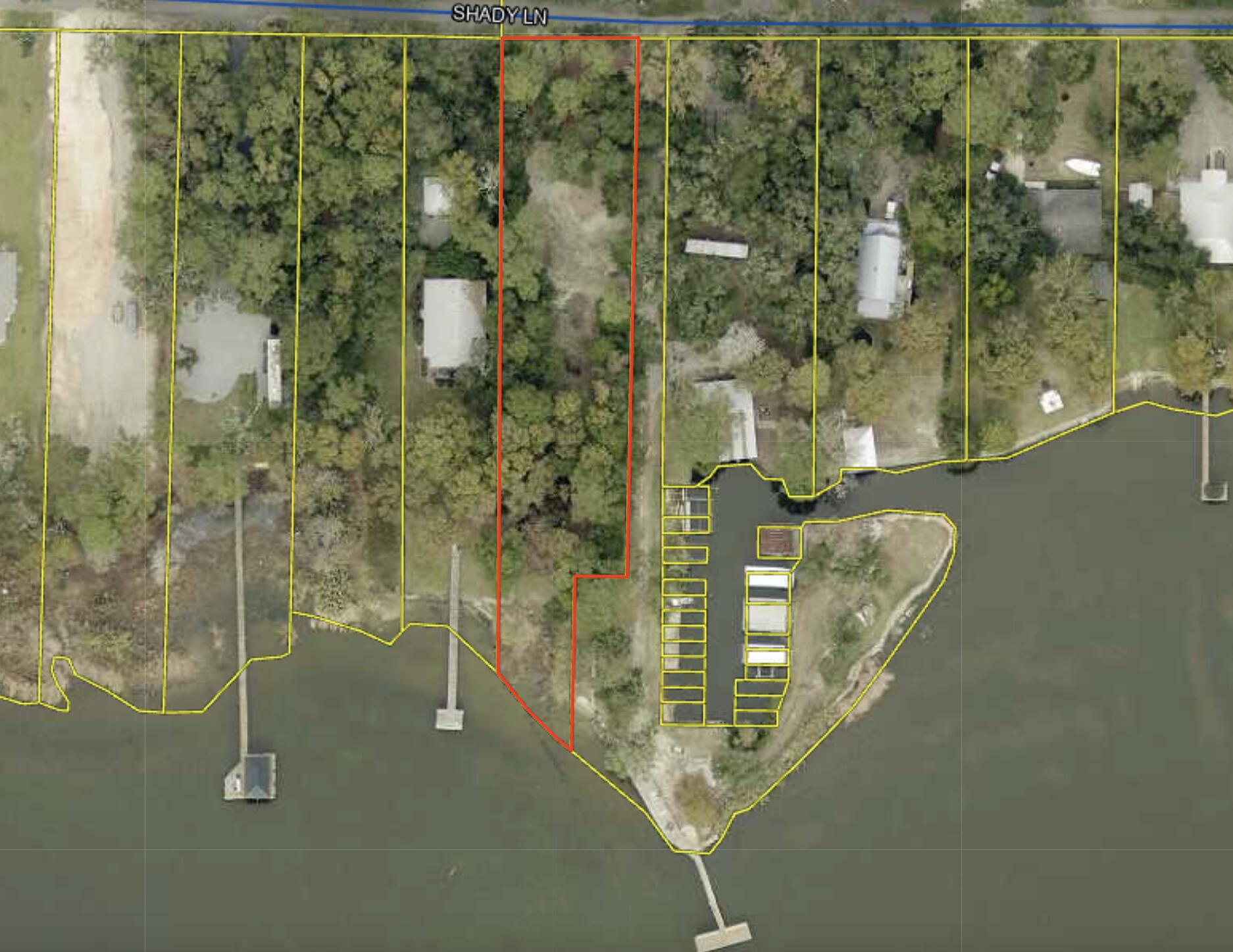 Discover a rare opportunity on Shady Ln with this 0.719-acre vacant waterfront parcel. Set along a peaceful natural waterway, this property offers a serene backdrop where the water becomes part of your everyday view--reflecting morning light, attracting local wildlife, and creating a calm, scenic atmosphere year-round.

The lot itself provides a generous, usable footprint with plenty of room to design a custom home that takes full advantage of its setting. Imagine a future residence oriented toward the water, with outdoor living spaces, gardens, or a private dock area, enhancing the lifestyle this location supports. Located on a quiet residential street, the property balances privacy with a relaxed coastal feel, making it an ideal canvas for a permanent residence or a peaceful retreat!