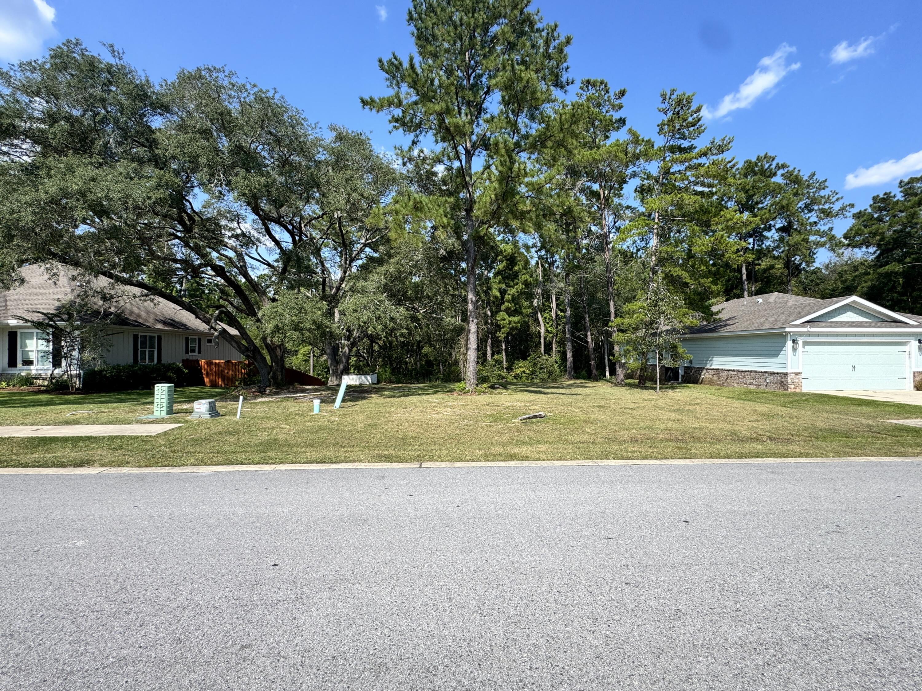 Don't miss your chance to own the final waterfront lot in the beautiful Lafayette Creek Landing community in Freeport. This ready-to-build homesite offers the perfect setting for a custom coastal retreat, complete with access to top-tier amenities including a resort-style pool, clubhouse with gym, scenic walking trails, and a private dock. Conveniently located just a half mile from Publix and under 15 minutes from the stunning Emerald Coast beaches, this prime location combines peaceful waterfront living with everyday convenience. Bring your builder and start planning your dream home today!