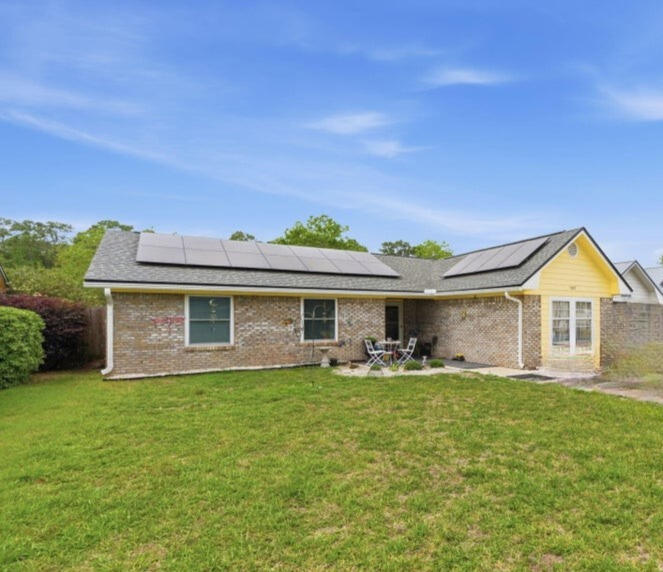 Great value with endless potential--make this 3-bedroom, 2-bath home your own! Tucked away on a paved cul-de-sac with no HOA, this property offers both privacy and convenience. Located just minutes from the beach, Panama City, the Navy base, Pier Park, shopping, parks, schools, and dining. Step inside to a cozy living room featuring a charming corner brick fireplace. The converted garage, complete with a closet and A/C venting, provides flexible space--perfect for a 4th bedroom, home office, or additional storage. Enjoy the private backyard with a shared fence and a newer 10x12 storage building, ideal for tools or outdoor gear. Major updates include:
Roof (6 years old)
Water heater (3 years old)
Three new windows with lifetime warranty (installed August 2023)
New patio slider door A/C approximately 11 years old and in good working condition
Fresh interior and exterior paint. Are you sick of your AC bill fighting this FL heat?? sweat no more! we got the perfect solution to those outrageous utility bills! Energy-efficient solar panels help keep utility costs low, with a $159.15 monthly lease and an average electric bill around $25. Don't miss this opportunity to own a well-located home with room to customize and grow!