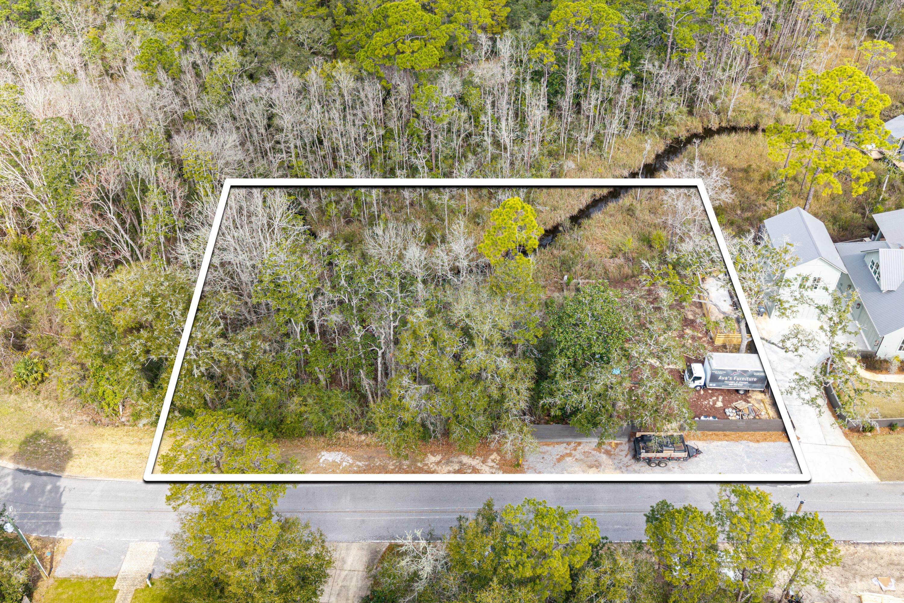 Bring your small boat or jet ski and get ready to enjoy the beauty of Point Washington! This canal front lot has been mitigated with seawall in place and  is ready for underground and your new home. 

Engineered house plans and survey available.