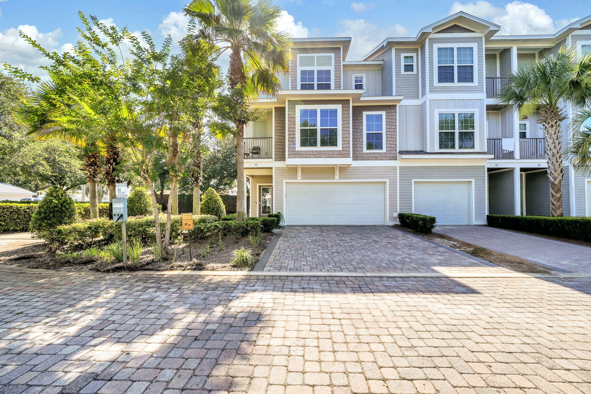 ***OPEN HOUSE, TUESDAY, JULY 14, NOON-2PM*** The ONLY 5-Bedroom Home Priced Under $1,000,000 in Miramar Beach South of Hwy 98! Opportunities like this rarely hit the market. Proven rental income, superior construction, over 2,600 square feet of living space, low HOA dues, heated community pool, and beach access right down the street all combine to make Driftwood Townhomes Unit 20 a value that's almost impossible to find.


Built in 2017, this fully furnished luxury townhome offers the space of a single-family home with the convenience of HOA-provided lawn and pool care. True craftsmanship is evident throughout, featuring nine-foot ceilings with crown molding, natural oak hardwood floors, porcelain tile, 8' baseboards, impact-rated windows, Trex decking, and durable fiber-cement construction. Engineered to comfortably accommodate up to 12 guests, the smart three-story layout maximizes space and flow. The first floor features a spacious king bedroom, custom built-in bunk room, full bath, private grill patio, the first of two washer/dryers, and the attached two-car garage with tile floor and insulated garage door. The second floor is an entertaining hub flooded with natural light, boasting an expansive open living area, a chef's kitchen with custom cabinetry, granite countertops, stainless appliances, an oversized wood island table, and a guest bedroom with a private balcony and shared bath. The third level serves as an owner's sanctuary, featuring a sprawling primary suite with a huge walk-in closet, a deep garden tub, and an oversized double-head shower. The third level also has another bedroom, en-suite bath, as well as the second washer/dryer set. The coastal-inspired furnishings throughout the home will convey to the new buyer. 

This high-capacity, luxury design is exactly why the numbers are so compelling for investors. While the property grossed over $62,000 in 2025, that figure reflects heavy owner usage during peak holiday weeks. Because the current owners prioritized the property as a well-maintained second home rather than a pure rental, a dedicated investor can expect annual projections to far exceed current performance. The rental manager has exceptional Airbnb reviews and would be happy to continue managing, providing immediate bookings and income. Additionally, the quarterly HOA dues are remarkably low at only $1,000/quarter. This efficiently covers lawn maintenance, trash, and the heated community pool, which keeps vacationers happy and profits strong. 

That exceptional income potential is driven by a fantastic coastal location. Unit 20 sits as the closest unit to the shore in the entire complex! It is only about 0.2 miles from the sugar-white sands of the Miramar Beach Regional Access by Pompano Joe's. This prime location places the property just minutes from world-class shopping at Silver Sands Premium Outlets, upscale dining and entertainment at Grand Boulevard and the Village of Baytowne Wharf, and top-rated coastal attractions along the coast. Offering the ultimate combination of size, location, builder quality, and cash-flow potential, Unit 20 represents a top tier investment in Miramar Beach. Schedule your showing today. A video tour is also available.