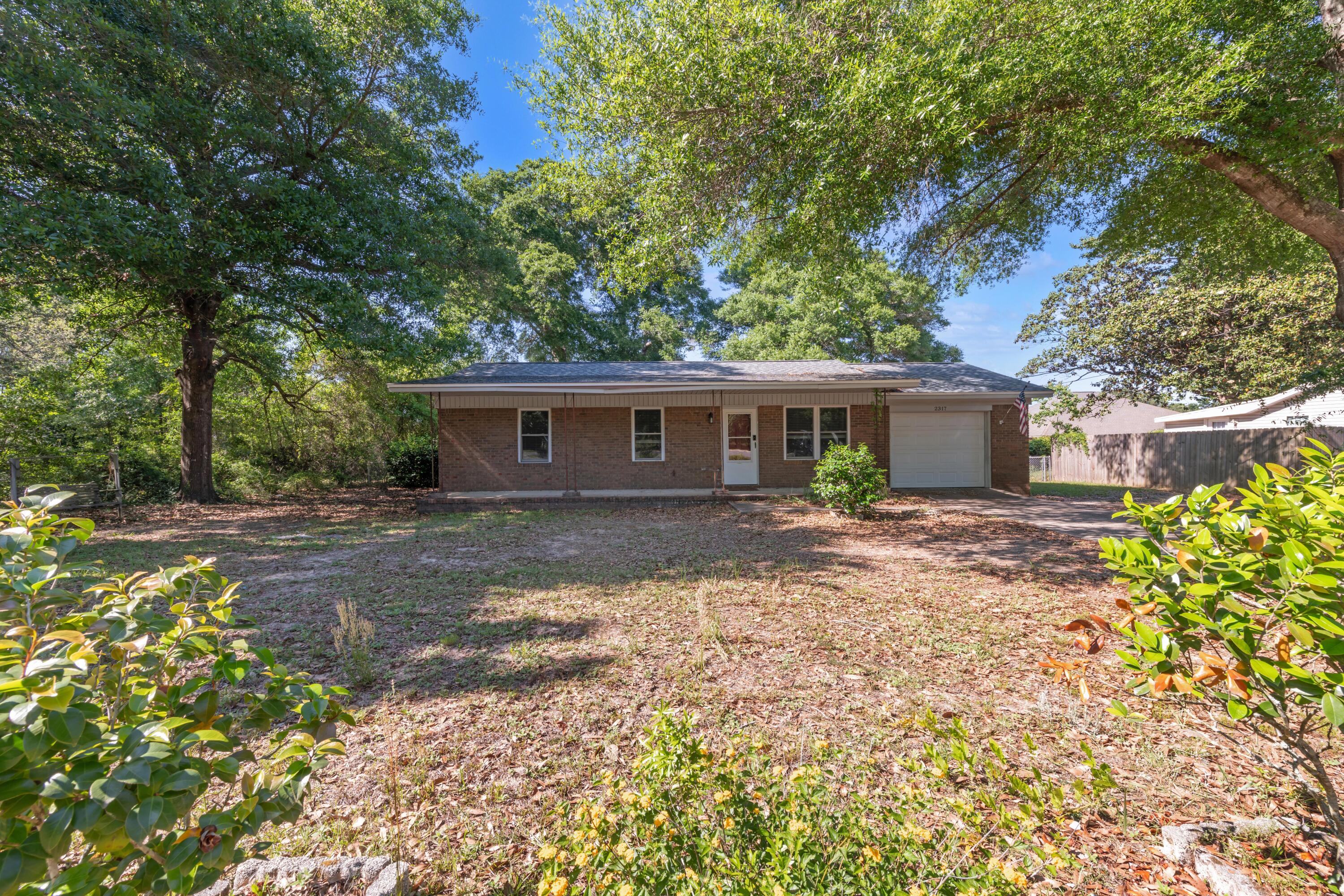 Fully renovated in 2023, this beautifully updated home features major system upgrades including the roof and appliances, offering peace of mind for years to come. Inside, you'll find custom cabinetry, granite countertops, and stainless steel appliances that create a stylish and functional kitchen space. The thoughtfully designed layout maximizes comfort and flow, making everyday living easy. The bathroom features a convenient shower/tub combo, while the large fully fenced backyard provides plenty of space for entertaining, pets, or outdoor enjoyment. This move-in ready home combines modern updates with a practical layout perfect for a variety of lifestyles.
