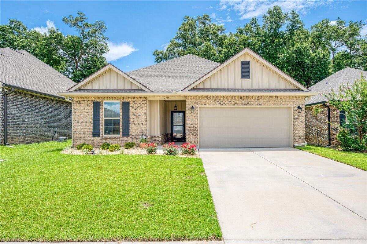 Welcome to this beautifully maintained 2023 DSLD-built home, offering modern design, thoughtful upgrades, and a fantastic location in a charming sidewalk-lined neighborhood! Step inside to an open-concept living space filled with natural light and finished in a neutral color palette that complements any style and NO carpet! The stunning kitchen serves as the heart of the home, featuring a large quartz-topped island, stainless steel appliances, sleek backsplash, breakfast bar seating, and abundant cabinetry. The spacious primary suite offers plenty of room to unwind along with a well-appointed en-suite bath featuring a double quartz topped vanity, garden tub, separate walk-in shower, and a large walk-in closet. On the opposite side of the home, two additional bedrooms provide privacy and share a full bathroom with a tub/shower combination. Out back, the home has been enhanced with a covered patio complete with ceiling fans, creating the perfect space to relax and enjoy the outdoors. The fully fenced backyard features lush grass and offers a blank canvas for gardening, play areas, or future outdoor living additions! Storage is abundant throughout, with thoughtfully designed closets featuring durable wood shelving. Additional conveniences include a dedicated laundry room with its own storage closet, a partial plug in generator that will convey and a two-car garage. Located just off West Spencer Field Road, this home offers quick access to Pace, Pensacola, shopping, dining, and e veryday conveniences, making this an ideal place to call home!