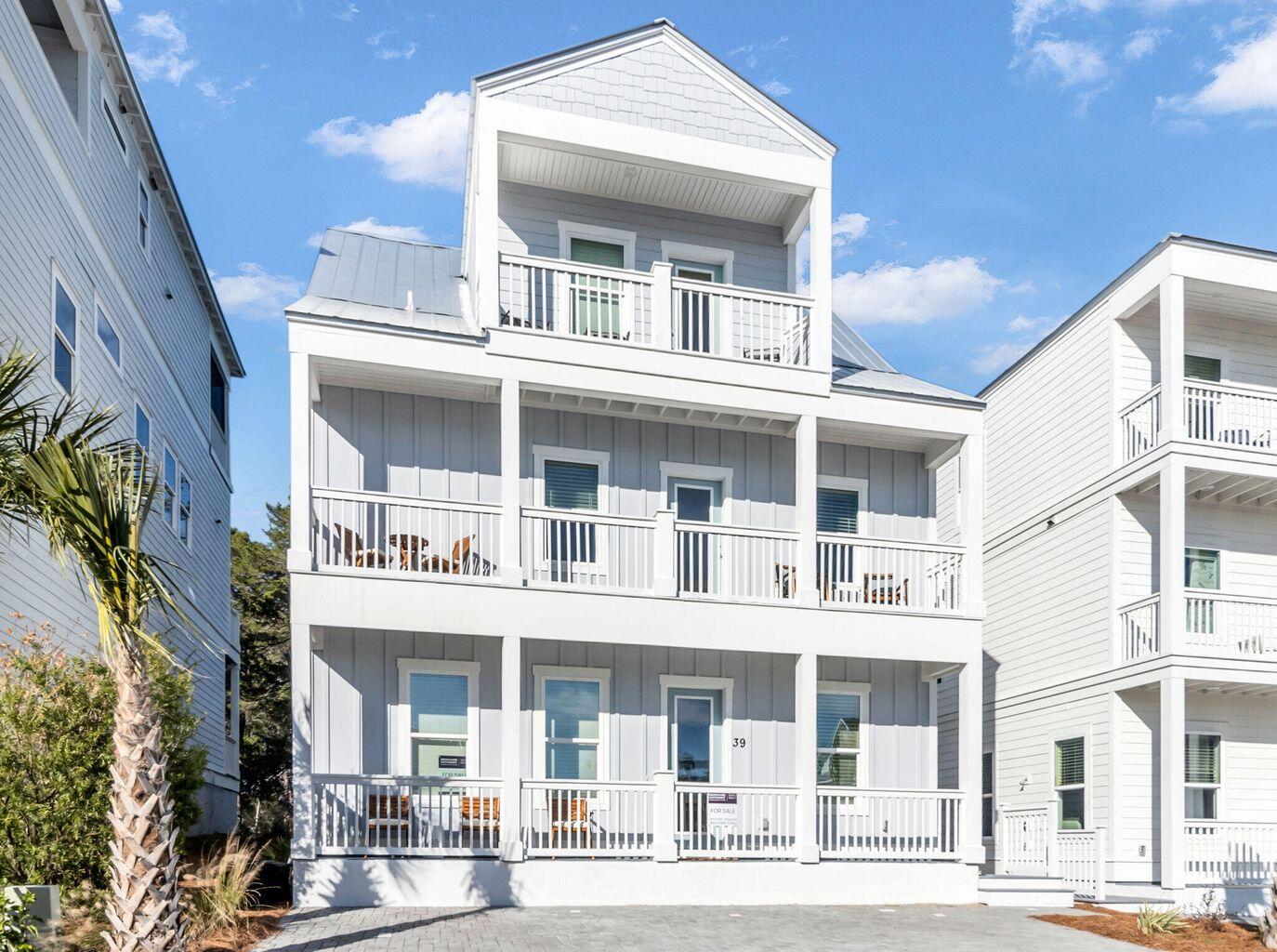 Discover this beautiful 3-story beach home perfectly positioned in Serenity at Dune Allen, a short distance from the sugar-white sands of the Emerald Coast. Backing up to a peaceful conservation area with no rear neighbors, this fully furnished and turnkey property is move-in and rental ready. High-quality furnishings, tasteful décor, large flat-screen TVs, small appliances, and complete kitchenware are all included.

The first-floor features soaring 10' ceilings, an open floor plan, a gourmet kitchen with quartz countertops, a spacious master suite, an additional half bath, and a large screened-in back porch. On the second floor, you'll find two bedrooms with king beds and two full bathrooms, plus two hallway bunk beds. The third floor offers a spacious loft with a bunk room (4 bunks) and a full bath. Every floor provides balcony access with tranquil views.

LVP and tile flooring throughout ensure both beauty and durability. Custom tile showers. The 3-car driveway allows ample parking for a golf cart and vehicles. With short-term rentals permitted, this property makes an excellent primary residence, second home, or income-producing investment.

Serenity at Dune Allen is a community located across 30A from the Dune Allen Beach access and close to popular 30A dining, shopping, and entertainment.
