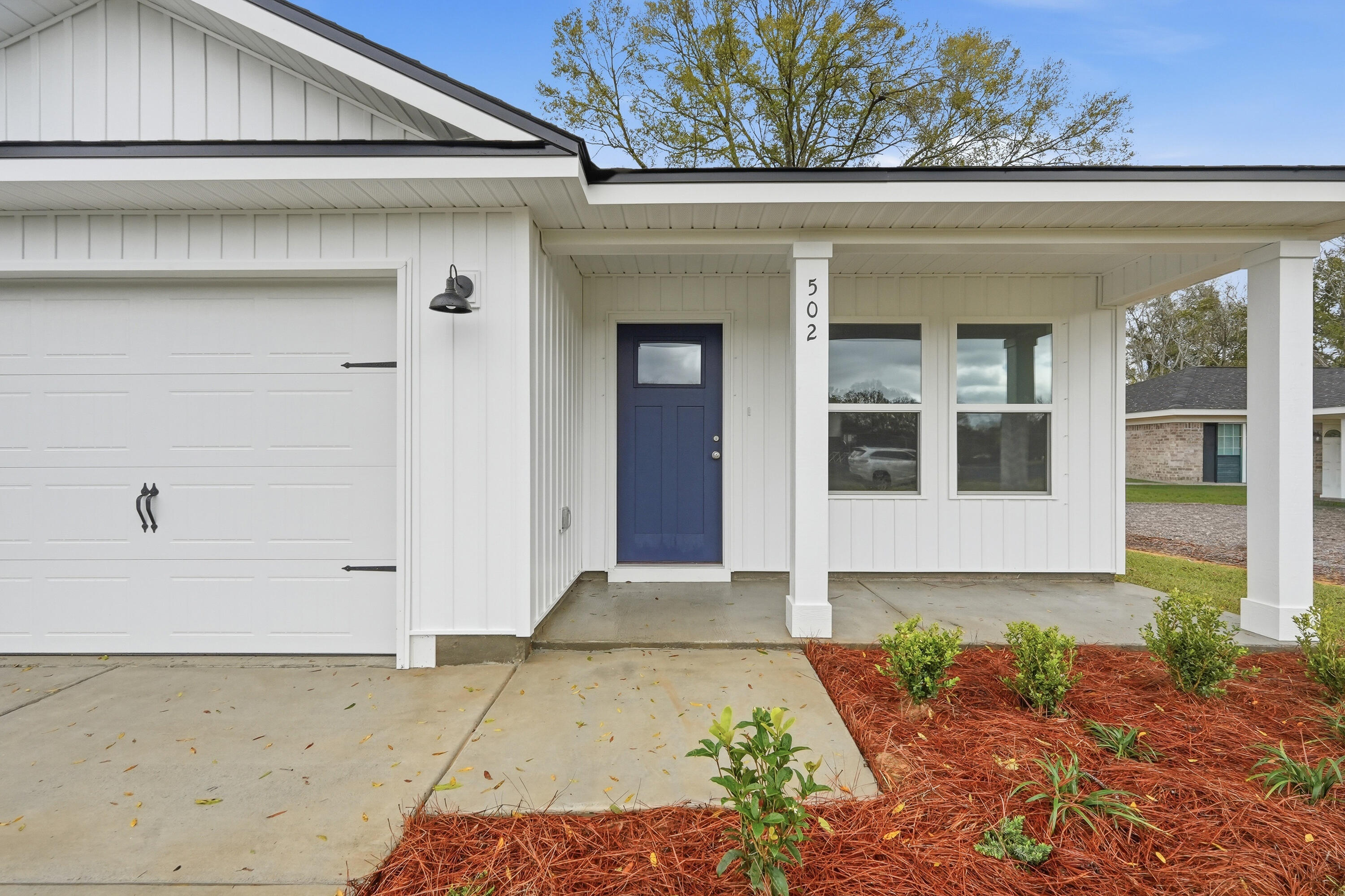 MID TOWN LOCATION AND READY IN EARLY AUGUST - $12,000 towards buyers closing costs (call for details).  ''Scarlet'' floor plan fits the budget, not too big and not too small.  Quartz work island w/bar seating in kitchen, large walk-in pantry, open family gathering space, owner's bath has walk-in closet, double vanities, + linen storage.  Raised ceilings, vinyl plank flooring throughout, recessed lighting, ceiling fans in all bedrooms + family room.
Fully landscaped yard, front & rear porches for relaxing, finished 1-car-garage.  Photos of similar sold home, elevation will vary, interior/exterior colors & finishes will vary.  EARLY AUGUST COMPLETION.  Call for more details.