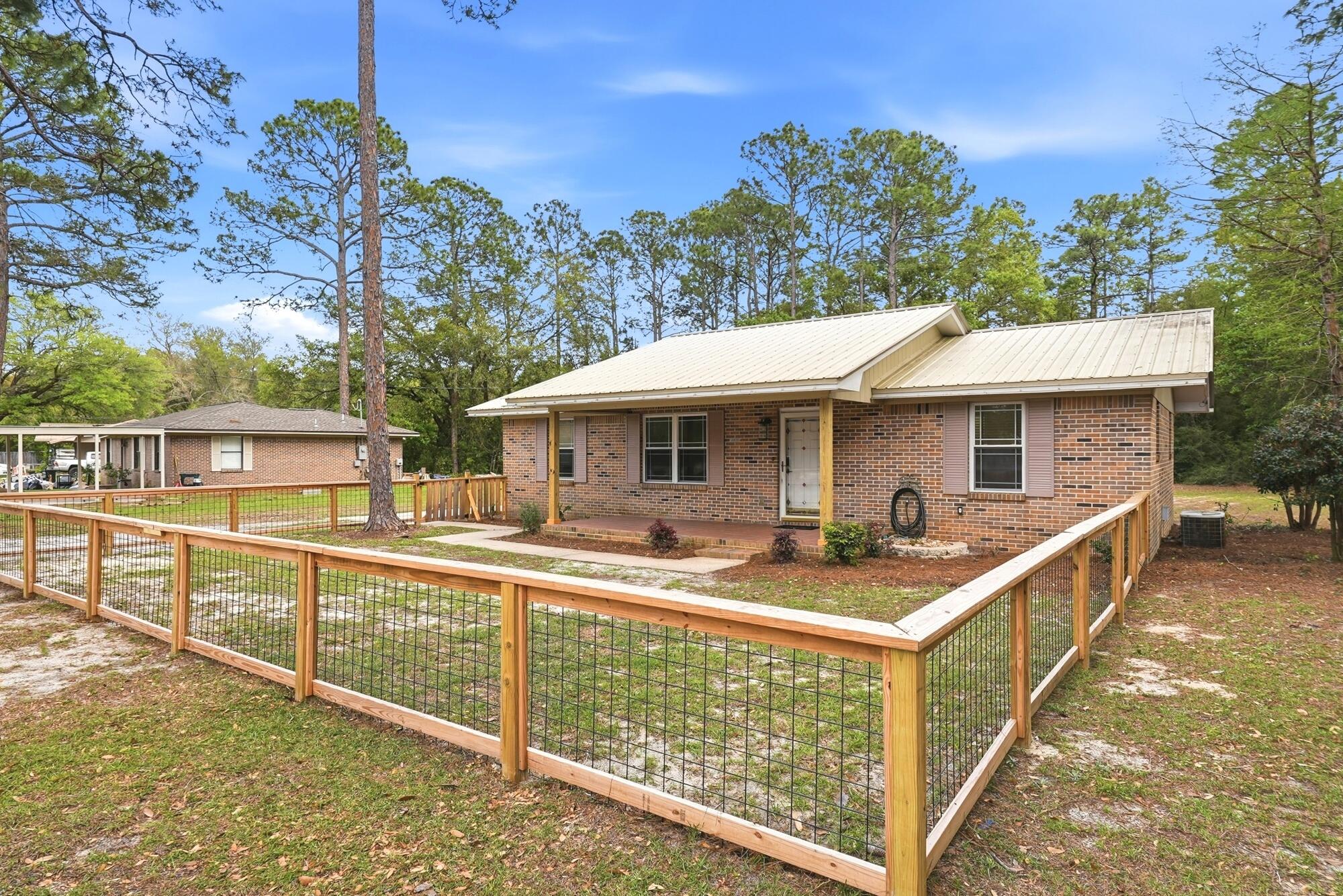 Meet your next home (and possibly your boat's new best friend).

This 3-bedroom, 1.5-bath brick charmer sits on just under half an acre--aka, room to breathe, park everything you own, and still have space left over. Tucked just minutes from Black Creek and the Hwy 331 bridge, you're only 9 minutes from the Pilcher Park boat launch, North Beach Social, and The Bay--and just 17 minutes from the beach when it's calling your name.

Inside, the kitchen has already had its glow-up, paired with tile floors and fresh paint throughout--so you can skip the projects and get straight to enjoying life. Outside, the covered front porch and fenced yard are ready for morning coffee, evening unwinding, and pets living their best lives. Got toys? Bring them. The oversized driveway has room for boats, RVs, trailers, and then some. The backyard? Big, open, and ready for BBQs, fire pits, or that future pool you've been thinking about--plus a storage shed to keep things tidy. And the best part: no HOA telling you what color your mailbox can be.

Whether you're looking for a primary home, a weekend escape, or your next investment with solid long-term rental potential--this one checks boxes you didn't even know you had.