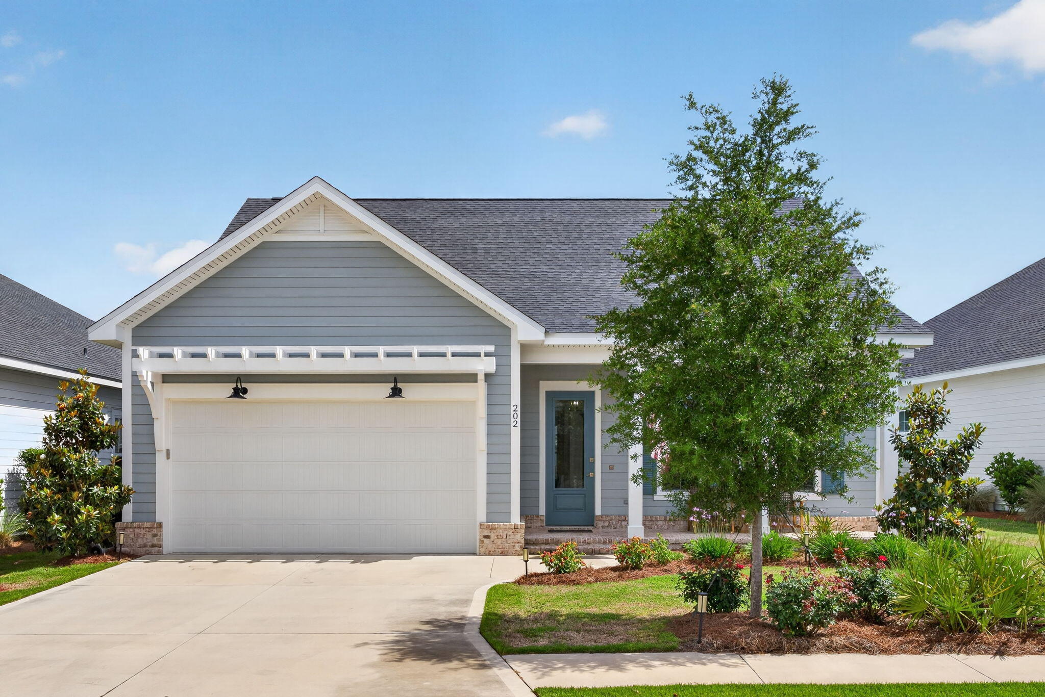Seller is offering $5k towards Buyers closing costs! Nestled within the sought-after Longleaf Park section of the Watersound Origins community, this beautifully maintained Huff Homes ''Bella'' floor plan offers a thoughtful blend of comfort, style, and convenience. Featuring 3 bedrooms, 2 bathrooms, and a spacious 2-car garage, this single-level residence showcases an open layout designed for easy everyday living and entertaining. Inside, you'll find upscale finishes throughout including soaring 10-foot ceilings, luxury vinyl plank flooring, quartz countertops, crown molding, recessed lighting, and soft-close wood cabinetry. The kitchen is equipped with stainless gas appliances, a vent hood, microwave drawer, tiled backsplash, under-cabinet lighting, and additional storage at both  the laundry room and oversized island. The home also includes a tankless instant water heater, upgraded gas package, outdoor gas hookup for grilling, and tiled showers in each full bath. Enjoy peaceful views from the screened rear porch overlooking a conservation area and retention pond, creating a private outdoor retreat just beyond the main living space. This particular Bella plan also features the desirable "Shed" elevation for added curb appeal. Longleaf Park is ideally positioned near the entrance of the community, offering quick access to the nearby Watersound Town Center with shopping, dining, healthcare services, a weekly farmers market, and Publix Super Market. Residents of Watersound Origins enjoy an exceptional lifestyle with access to resort-style amenities including the Village Commons pool and fitness center, tennis and sports courts, miles of scenic walking and biking trails, golf privileges, dock access to Lake Powell, and expansive green spaces throughout the neighborhood.