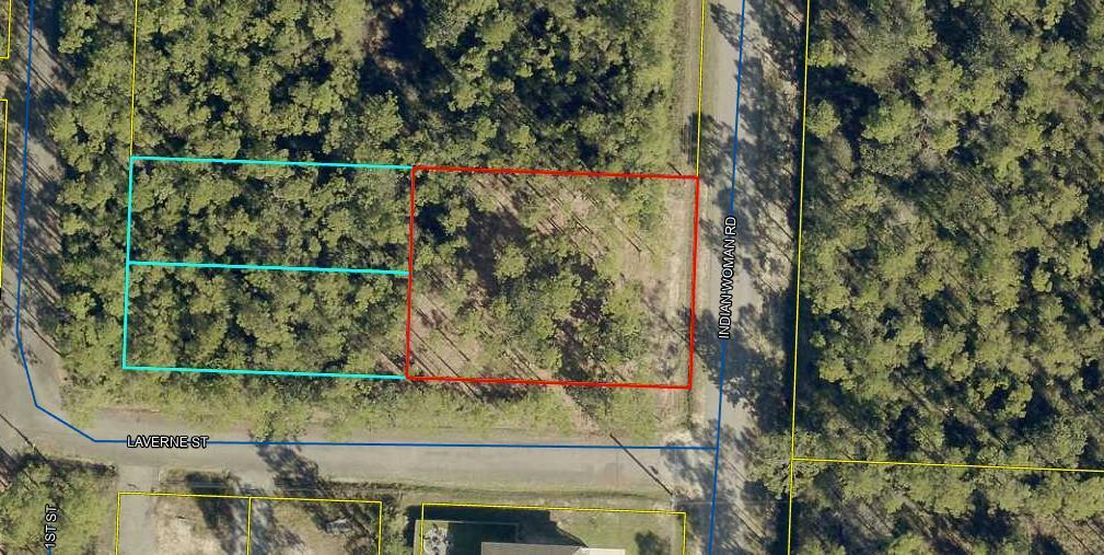FOUR UNRESTRICTED BUILDING LOTS - being sold together.  Convenient, Santa Rosa Beach location.  No HOA or restrictions.  Manufacured Homes, Tiny Homes, or Mansions are Welcome! Opportunity for builder to purchase four lots together.  Opportunity for homeowner to have extra land for additional living areas or storage areas.  Opportunity for future Investment - build on one lot and sell remaining lots or hold for future growth.  Many possibilities with these four lots!  Surrounded by new construction along Indian Woman Road.  Owner wants to sell all four lots together and does not want to split them up.  City water and sewer available.  Lots are wooded so you can keep as much privacy as desired.  Easy drive to the Beach.  Bayfront and Bayoufront Parks are near by as well. Great shopping along 30-A, Grand Blvd, Sandestin, or Silver Sands Outlet Center.  Here is your Opportunity!