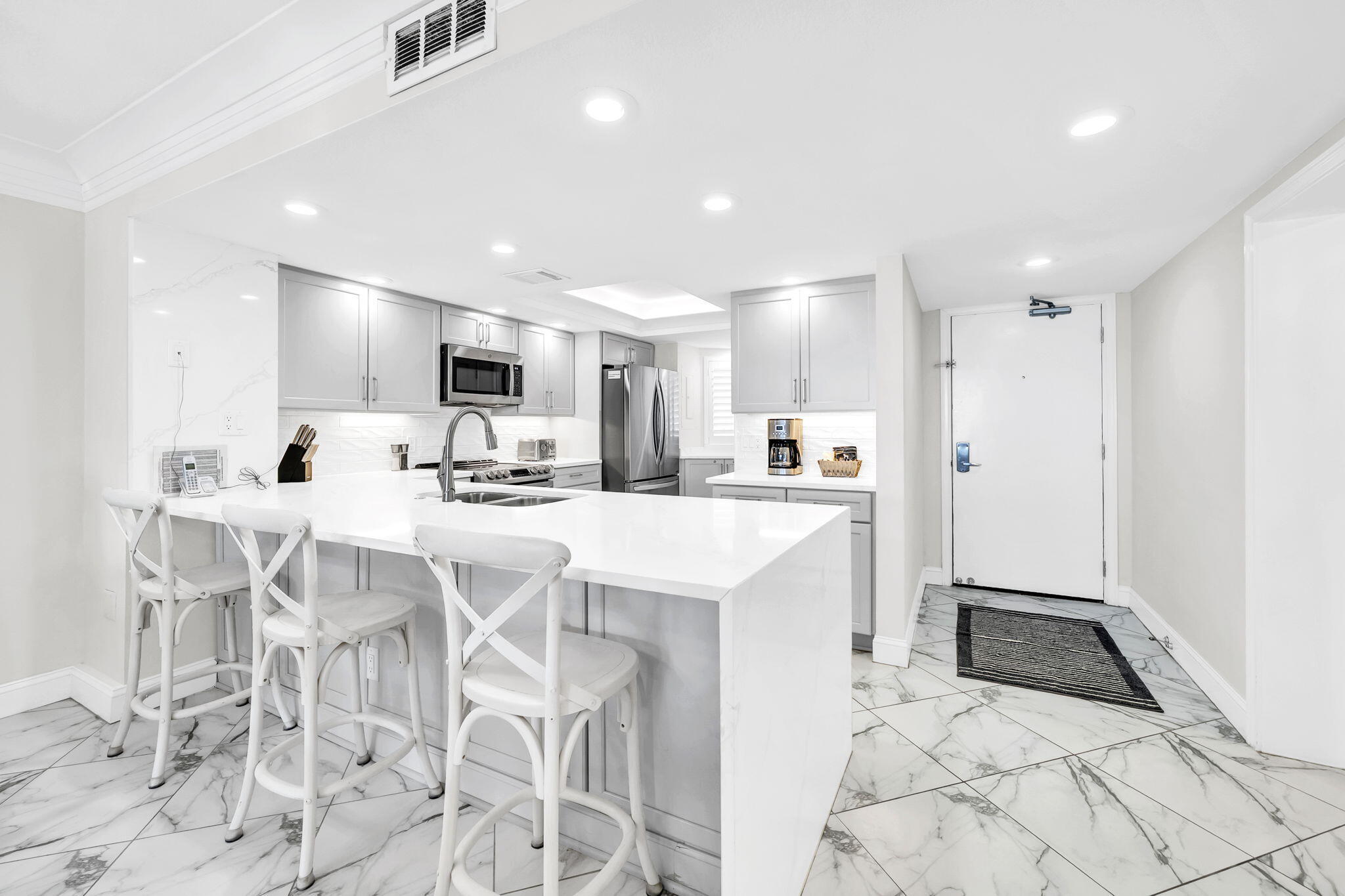 Welcome to your completely remodeled Gulf-front retreat--priced to sell and ready to deliver both luxury living and strong investment potential. Nestled within the privately gated Edgewater community, this stunning second-floor condo offers the perfect blend of elevated design and effortless beach access--just steps from the sand and resort-style pools.

Inside, you'll find designer flooring throughout and a show-stopping kitchen featuring endless custom quartz countertops, artisan-crafted soft gray cabinetry, a custom backsplash, and sleek stainless steel appliances--curated for both style and function.

The spacious master suite is a true sanctuary, complete with private balcony access and sweeping Gulf views. The spa-inspired ensuite bath showcases a large walk-in glass shower. While the guest bath offers a relaxing Roman tub/shower combo. This unit comes fully equipped w/ an in-unit washer and dryer for convenience.

Step outside to your oversized Gulf-front balcony, where sunrise coffees and sunset views become part of your daily rhythm. Additional highlights include a semi-private elevator (serving only the first and second floors) and plenty of covered/garage parking spaces beneath the building + overflow parking!

Edgewater's resort amenities elevate the experience even further, with two pools, a hot tub, tiki bar, fitness center, basketball courts, shuffleboard, playground, and expansive green space--all within a gated, private beach setting.

Whether you're searching for a luxury second home or a high-performing rental, this turnkey coastal gem checks every box.