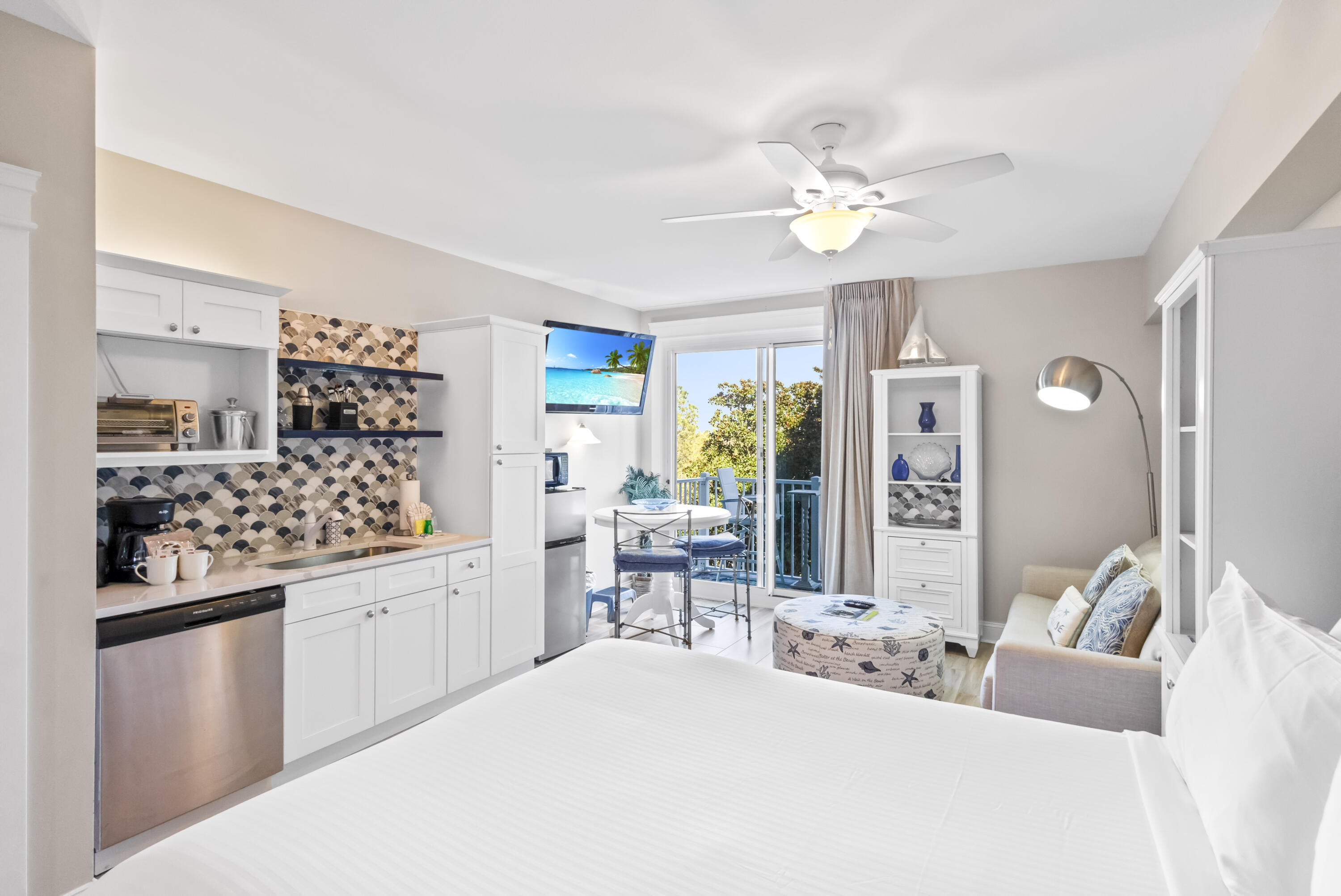 Guests & owners alike will adore this charming renovated studio with a balcony offering a modern ambiance and over $10k invested in new furnishings. Featuring new porcelain plank tile flooring throughout! The new kitchenette boasts sleek white cabinets and countertops, an added pantry, and a stylish fish-scale tile backsplash in shades of blue, gray, and white, complemented by floating shelves. For added convenience, the kitchenette includes a midsize refrigerator, microwave, dishwasher, and a new sink. The elegant fish-scale tile design continues into the bathroom, enhancing the shower backsplash, while a new white vanity and shelving provide a clean, contemporary touch. . Additionally, there's a brand-new water heater, making this condo move-in ready and perfect for a relaxing getaway. The Grand Sandestin welcomes you with gracious architecture and luxurious amenities including a fitness center, swimming pool, seasonal on-site check-in, and concierge services. Enjoy the location adjacent to the Village of Baytowne Wharf, a pedestrian market place that hosts a variety of dining and shopping venues as well as fun for the whole family!
As an introduction to the Sandestin lifestyle, we invite our new owners to explore amenities that make Sandestin special. The listing brokerage and seller(s) are presenting the buyer(s) of this property with (2) 90-minute rounds of Tennis court time, a golf foursome at one of our three championship courses, and a round of golf for up to four (4) players at the unrivaled Burnt Pine Golf Club.
Sandestin Golf and Beach Resort features more than seven miles of beaches and pristine bay front, four championship golf courses, 15 world-class tennis courts, a 226-slip marina, a fitness center, spa and celebrity chef dining. Shop, dine and play at the charming pedestrian village, The Village of Baytowne Wharf and more. Inside the gates of the resort, residents enjoy a balanced lifestyle of high-class living, spanning the 2,400 acres from the beach to the bay. Everything within the gates of the resort is accessible by golf cart or bicycle. The entire resort is interconnected by miles of pedestrian, bike and golf cart paths that weave through groves of live oaks, meandering past natural lagoons, fountains, man-made lakes, and meticulously landscaped fairways.