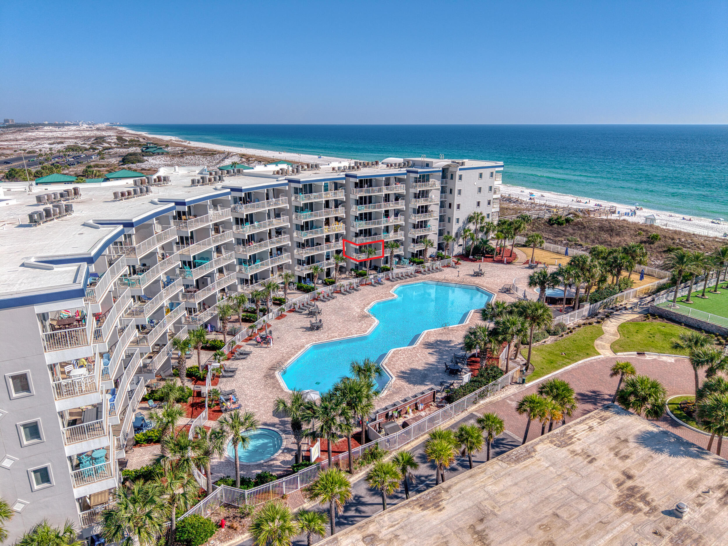Gulf front unit. With all condo structure required inspections done for an easy purchase to own a white sand property. HOA amenities include five pools, a lazy river, three hot tubs, charcoal grilling stations with picnic areas, a kids play zone, fitness center, covered garage parking, and a sky bridge providing direct access to the sound side. Unit #205 is positioned on the beachside of the building, no road to cross and no walkover needed. Beach access is steps away. The unit is located close to the elevators for convenient access and offers Gulf views overlooking the main pool area. The layout is open, efficient, and flows to a private balcony with strong natural light. Located on Okaloosa Island, you are connected to the new bike path running along the island and minutes from John Beasley Park, which includes a public boat launch and expanded beach access. Boat storage facilities are available throughout the surrounding area, making it practical for owners who want both Gulf and sound access.

You are also close to the Okaloosa Island Pier and Gulfarium Marine Adventure Park, along with The Boardwalk on Okaloosa Island and multiple waterfront dining options.
Convenient to Eglin Air Force Base and Hurlburt Field, this property works as a primary residence, second home, or income-producing investment in a strong coastal location.