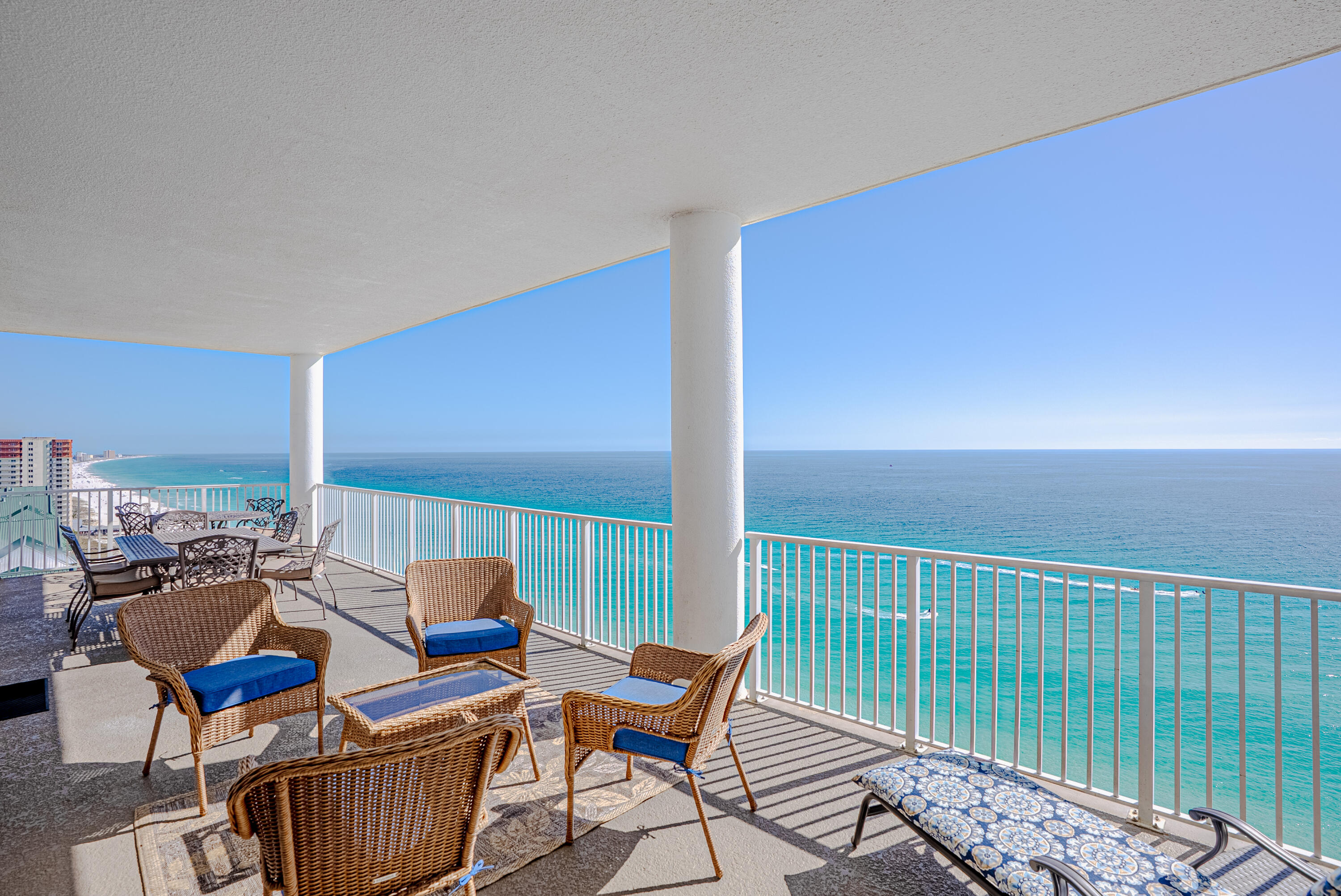 CURRENTLY UNDER CONTRACT, SELLER WILL CONSIDER BACKUP OFFERS' Experience the best of Gulf-front living and investment potential with this exceptional 4-bedroom, 4-bath penthouse residence at Ocean Ritz, one of Panama City Beach's most sought-after low-density beachfront properties. With only three residences per floor and just 63 condos in the entire building, this property offers privacy, space, and unobstructed views of the Emerald Coast. Located on the 22nd-floor penthouse level, this beautifully furnished and fully rental-ready condo features 1,637 sq. ft. of living space and soaring 10-foot ceilings, a full foot taller than the other floors, enhancing the open and airy feel throughout. The thoughtfully designed floor plan includes four spacious bedrooms and four full baths, highlighted by two Gulf-front master suites with direct balcony access, allowing you and your guests to wake up to panoramic views of the Gulf. The open living and dining area flows seamlessly into a well-appointed kitchen with beautiful granite countertops. Tile flooring throughout provides a clean coastal aesthetic with easy maintenance. Step outside to the oversized Gulf-front balcony,approximately 493 sq. ft., one of the largest on the beach, offering breathtaking views over the sugar-white sands and emerald waters. Whether enjoying morning coffee, outdoor dining, or evening sunsets, this expansive outdoor living space is truly the highlight of this condo. For investors, this property delivers strong rental performance and it is sold fully furnished with future bookings already in place, making it a turnkey opportunity. An additional standout feature is the premier oversized covered parking space located under the building on the building side, immediately next to the elevators, a rare and highly desirable convenience for owners and guests. Ocean Ritz amenities include: * Gulf-front seasonally heated pool * Hot tub and spa * Fitness center and sauna * Outdoor grilling area * Low-density beachfront living with only 3 units per floor Situated in the heart of Panama City Beach, Ocean Ritz is just minutes from popular restaurants, shopping, and entertainment while offering direct access to the Emerald Coast's world-famous white sand beaches. Whether you're seeking a high-performing vacation rental investment, a luxurious second home, or both, this penthouse residence offers the ideal combination of location, space, rental income potential, and breathtaking Gulf views.