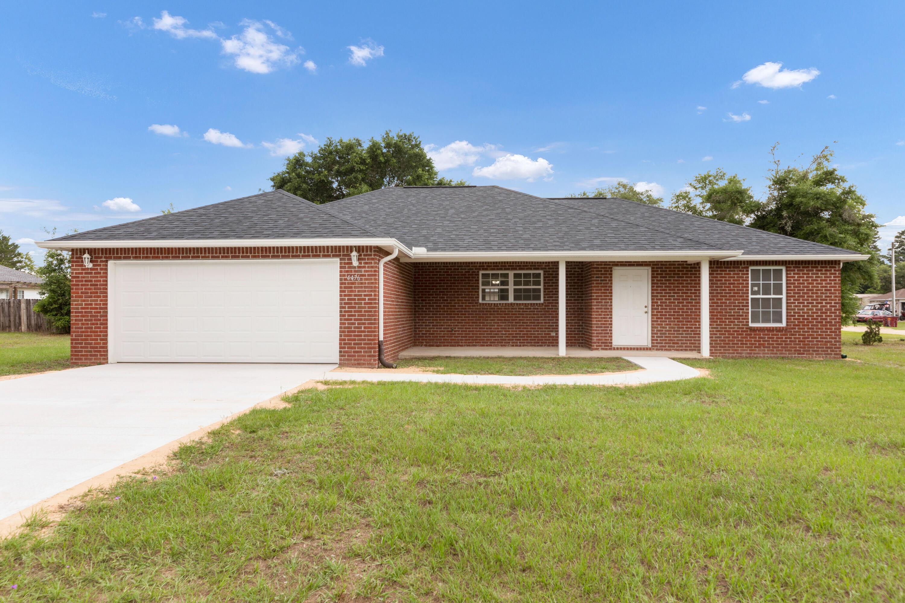 A wonderful starter home or investment is ready and waiting for its new owners.  Situated on a large lot on a paved road is a comfortable and accommodating 3 bedroom, 2 bath home.  No HOA!  The home features a large kitchen with a breakfast bar and an eat-in dining area, all open to the great room.  A split plan thoughtfully adds privacy and a place to get away.  The master bath has double vanities, garden tub, separate shower, large walkin. Roomy laundry room has both washer/dryer and the 2nd refrigerator (all included).  The owner has made substantial improvements in 2025 to include a new roof, new driveway and walk, new garage door, full gutters, new interior paint and carpet, new water heater, new Trane HVAC. All to make your living easy and enjoyable from the minute you move in!
