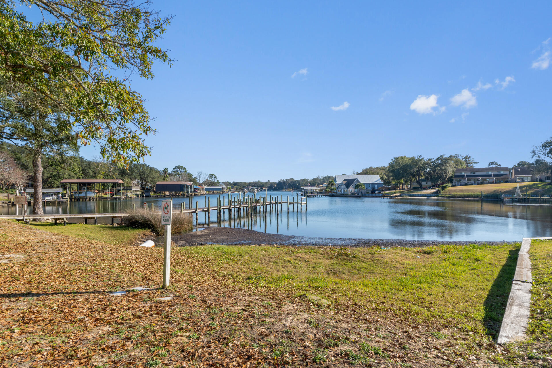 Rare, spacious 3 bed 2 bath unit with an assumable VA loan at 3.6%. Located in a waterfront community offering a bay front pool, private dock access, and tennis courts. This move in ready unit features LVP flooring throughout, tile in wet areas, in unit washer & dryer hookups, and a third bedroom with a private entrance, ideal for guests or long term roommates. Enjoy the Florida lifestyle with paddle boarding, kayaking, boating, fishing from the community dock on Cinco Bayou, relaxing by the pool, or grilling in the courtyard. Boat slips are first come, and on site boat storage and parking is available.