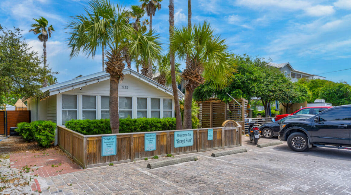 GRAYT FUN at Grayton Beach. One of the last lots at Grayton with a beach view if you decide to build a home with a second floor.  Amazing location, simple home. Owner Financing Available.