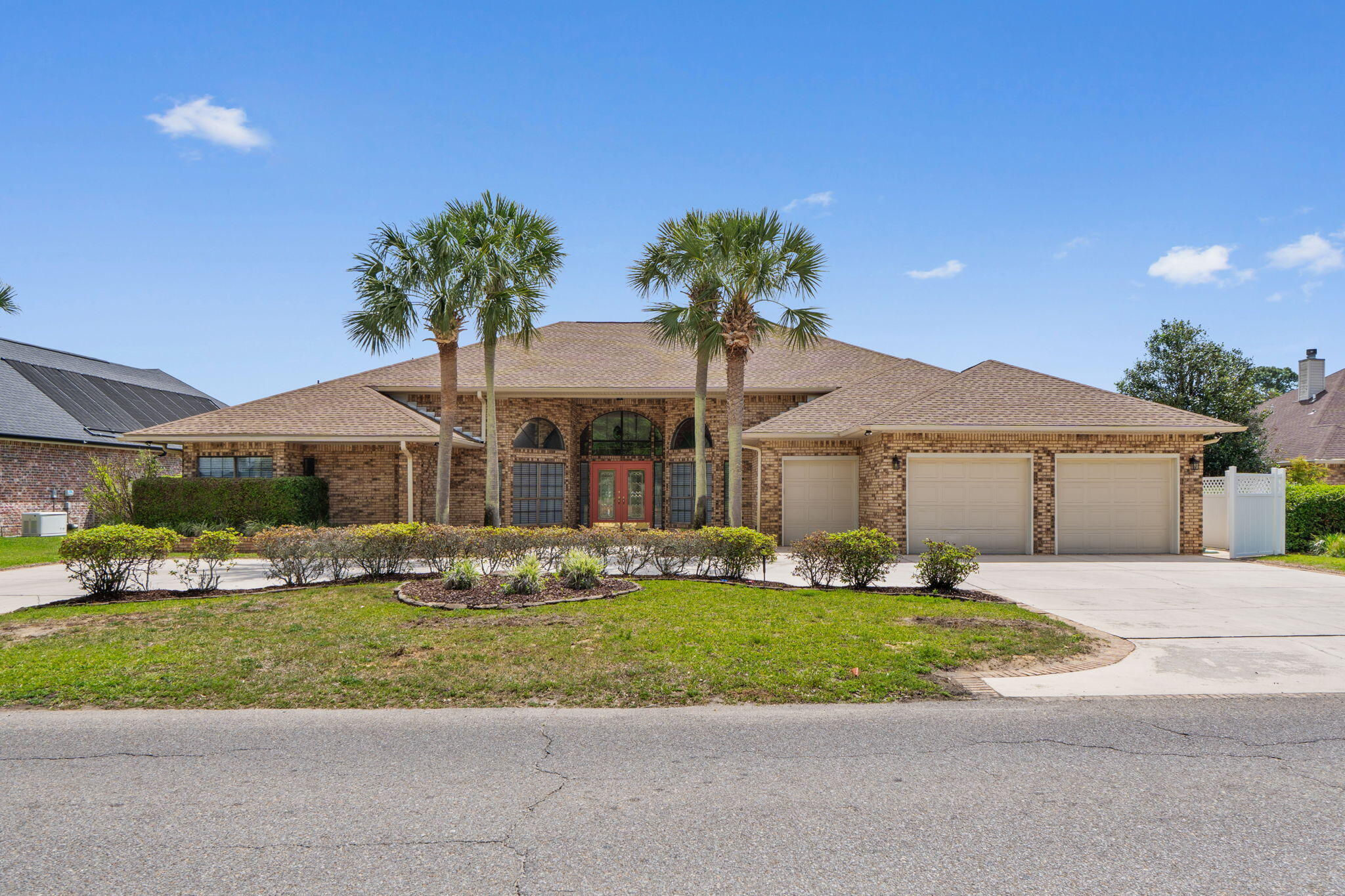 Are you searching for a stunning pool home on the golf course?  Look no further, this exceptional property has it all.  Schedule your private showing today to experience this full brick, nearly 3400 sq ft home situated on the 5th fairway in Hidden Creek Estates at Holley By The Sea.  This property features a horseshoe driveway, a three car garage, a recently updated gunite pool with a large screened enclosure.  Inside you will find elegant crown molding, 14 foot ceilings, a wet bar, granite counter tops and so much more.  Recent updates include HVAC & ductwork (2024&2025), water heater (2026), roof (2022), custom closets in the primary suite, LVP and tile floors, newer window treatments and updated landscaping. Holley By The Sea amenities includes usage of the multi-million-dollar 45 acre recreational center with clay tennis courts, swimming pools, pickle ball courts, full gym, aerobics, summer camp, lighted basketball courts, sauna & steam room, playground, game room, community house on Santa Rosa Sound with playground, dock and access to the East Bay boat launch.