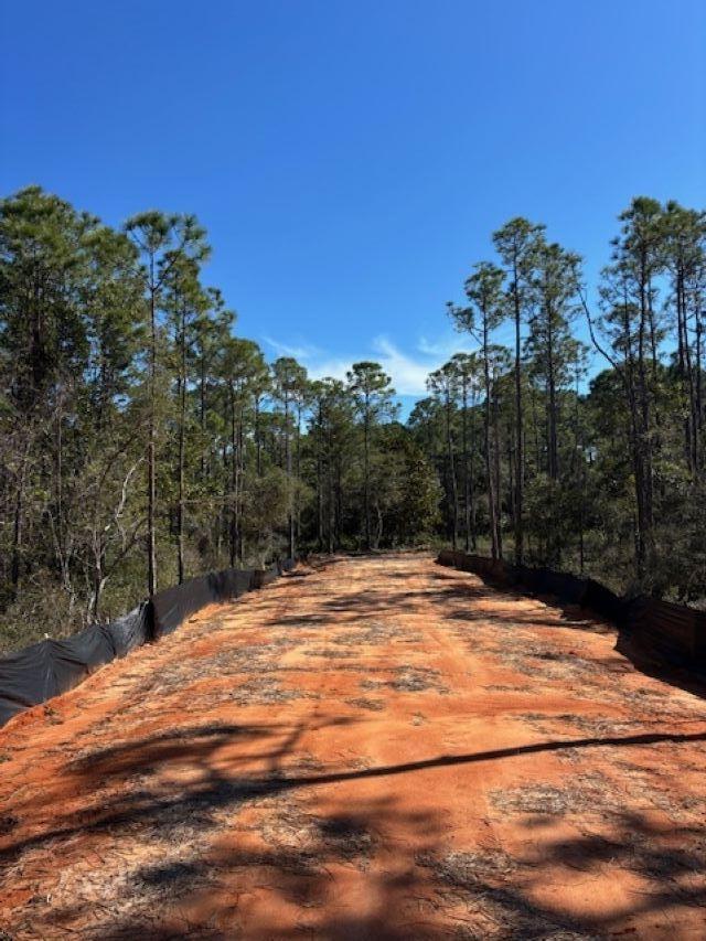 Rare opportunity to build your Dream home/Estate on a peaceful and private 4+/- acre
site, located between Gulf Breeze and Navarre, South of highway 98.
Driveway area is cleared and padded.
Wetland maps and property maps are available in the listing documents and photos.
All information is deemed reliable but is NOT warranted or guaranteed by seller or listing
Broker.
Buyer(s) and Buyer's Broker are responsible to conduct their own due diligence and
confirm all information including but not limited to acreage, measurements utilities,
zoning and suitability.
Owner licensed Real Estate Broker in the state of Florida.