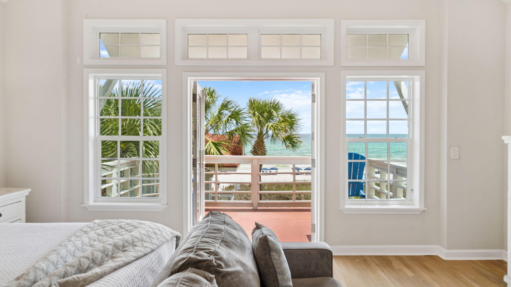 'Surfin Sea', the property at 3 Starboard Ct, Miramar Beach, FL, is a remarkable and luxurious residence that spans 3,026 square feet and comprises 5 bedrooms and 5 bathrooms. The home is not only spacious but also offers stunning views of the Gulf. It is beautifully situated within a quintessential coastal picket fence, framing its lot. The opulent gulf-front home extends over three vertical levels, providing an inviting atmosphere of luxury and ease. The opulent gulf-front home extends over three vertical levels, providing an inviting atmosphere of luxury and ease. It also features a private pool. Thoughtfully designed terraces and balconies overlook the serene white sand dunes and the emerald waters, enhancing the overall appeal of this property. Beautifully nestled within the gates of a quintessential coastal picket fence framing its spacious lot, this opulent gulf-front home spans three vertical levels and invites guests into luxury and ease with over 3,000 square feet, five bedrooms, five baths, and a private pool. Thoughtfully designed terraces and balconies overlook the white sand dunes and emerald waters with the view becoming more panoramic with each ascending level. The first floor encompasses the main living area with a feature fireplace and light, natural wood flooring flowing seamlessly out onto the covered screened porch.
Find an indulgent spot to sip coffee at the back deck counter and watch the sunrise state-of-the-art café kitchen makes entertaining easy with new stainless appliances, a gas range, plenty of prep space on the large kitchen island, a breakfast nook, and a formal dining area. The second-floor primary bedroom oasis features access to spectacular views from the private balcony and includes an ensuite with twin vanities, large shower, and separate jetted tub. The third floor is a thoughtfully designed main suite retreat with an exclusive private balcony and spa bathroom with shower, double vanities, and another jetted tub. Guests are welcomed with a choice of the bunk room area or private space in the detached carriage house above one of the two garage spaces. Even the garages are planned with enjoyment in mind with one designated for parking (one car) and the other dedicated to an inside play space. The one-bedroom guest house sleeps four and includes a kitchenette, full bath and living area with sleeper sofa. The property includes a 20'x8' courtyard pool and an outside grilling station with even more Gulf views. This idyllic beach house is in the gated community of Shipwatch and has 400 feet of private beachfront along Scenic 98. Adventurers will enjoy the ideal location for walking or biking along Scenic 98 to restaurants, the outlet mall, and Grand Boulevard. 3 Starboard Court is the ideal floor plan for a single family home, second home or vacation rental with sleeping space for up to 22 guests