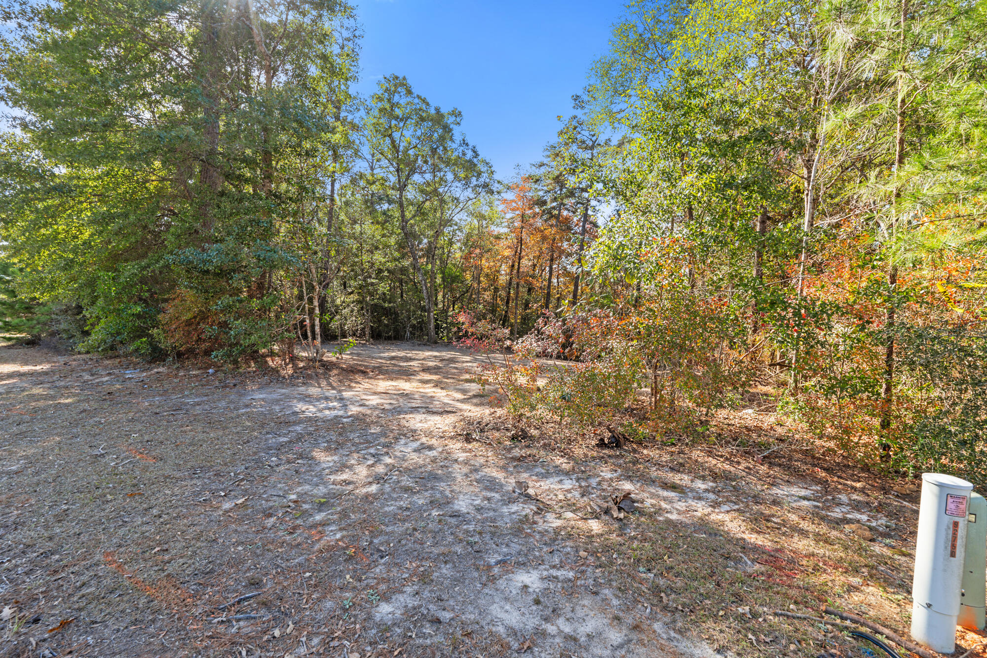 Under Contract - Taking Back Up Offers-Welcome to Lot 25 in the desirable Nanterre Subdivision in Crestview, FL! This newly cleared vacant parcel is perfect for your dream home, offering a serene residential setting with nearby amenities. Located conveniently off Lake Silver Road and near Hwy 85, it ensures easy access to schools, shopping, and dining. Adding to its charm, the scenic Yellow River runs right through your backyard, providing a tranquil natural backdrop. While this neighborhood is ideal for those looking to build a single-family home, please note that current zoning does not permit mobile homes. Enjoy the peaceful surroundings and the convenience of Crestview's growing community. Don't miss this opportunity!