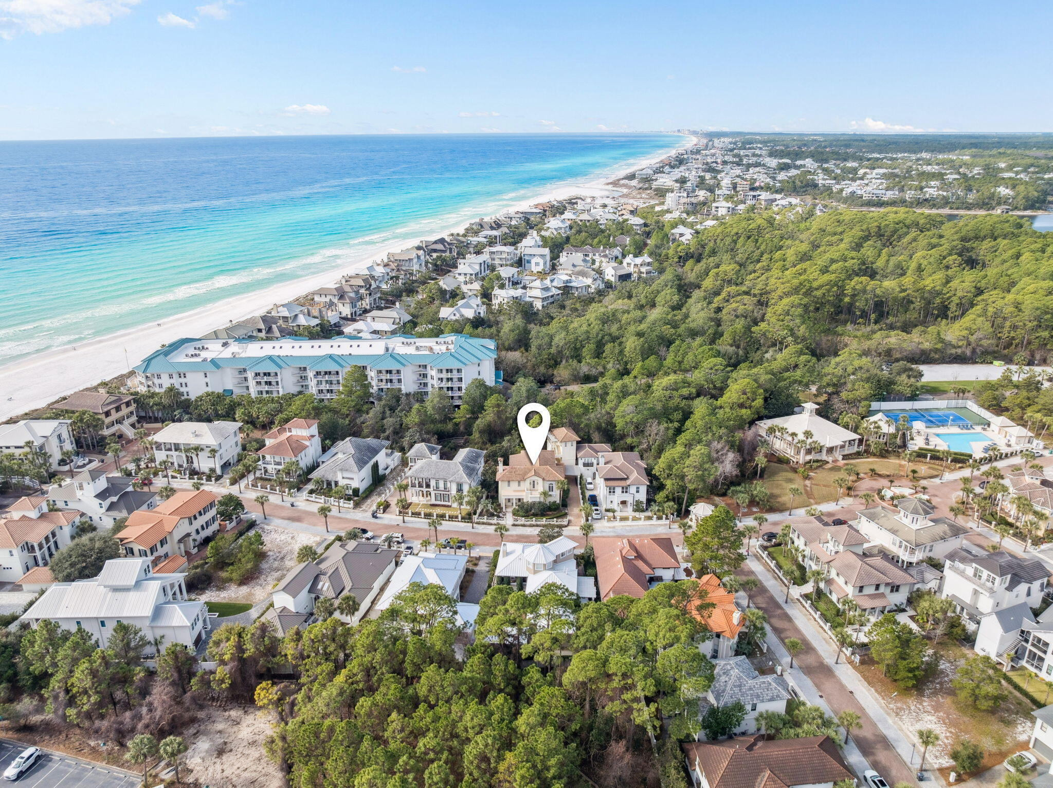 WOW - European-influenced residence with superior ICF-constructed [insulated concrete forms], originally designed by renowned architect Tom Christ. This home artfully marries timeless Old World detailing with the elegance of coastal Florida living. This rental-restricted community offers luxury amenities such as a club house, heated pool, pickle ball & tennis courts, in addition to a PRIVATE BEACH just steps away, complete with a viewing tower. The home is located just 5 houses back from the beach access. The primary suite has a renovated bathroom. New roof appx 6 yrs, 2 new A/C units, glass in most windows replaced. **NOTE: Rendered photos with pool on patio are for illustrative purposes only. Would need approval through the ARC. Steeped in classic graceful arches, beamed and coffered ceilings, and rich hardwood floors create an inviting yet refined ambiance. The thoughtful floor plan encompasses five spacious bedrooms and four and a half baths across approximately 3,700 square feet.  

Perfectly positioned between the private deeded beach access and the community hub, this exceptional residence offers immediate proximity to sugar-white sands and emerald waters of the Gulf   just a short stroll away through scenic walkovers.  

Step outside to enjoy a beautifully landscaped setting, complete with an outdoor dining area under a pergola and built-in gas grill perfect for alfresco evenings with friends and family. 

So whether you're seeking serene seaside relaxation, active outdoor living, or elegant indoor entertaining, 152 White Cliffs Blvd embodies the best of 30A.