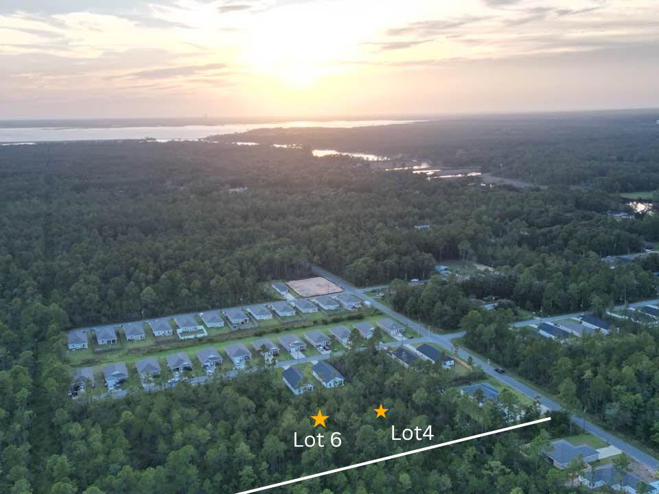 Lots 4 & 6 - Build Your Custom Home in an Established Neighborhood 
Don't miss this opportunity to own Lot 4, Lot 6, or both together in an established neighborhood with public water and sewer available. Lots may be purchased together or separately, offering flexibility for homeowners, builders, or investors. Zoned R-1, these parcels are designated for site-built homes only (manufactured homes are not permitted). A Wetland Study will be required prior to development. The property is located in Flood Zone X, meaning it is not within a designated flood hazard area. An access agreement with the Public Works/Road & Bridge Department will be required, and the buyer will be responsible for clearing the access. While public water and sewer are available, there are no existing sewer laterals, as the area is served by a force main. WANT INDIVIDUAL LOT? SEE mls 1008501 & 1008502
