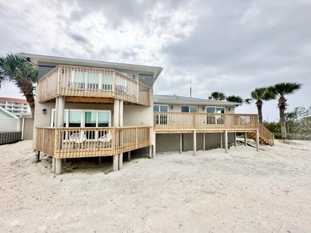 AVAIL: 5/23, preferably 6 mo. 1 day lease term w/ some flexibility. S/D = $4K, can be broken up in 2 monthly installments if qualified. Pets upon approval w/ a fee. Utilities included up to $500/month. GORGEOUS newly renovated fully furnished waterfront home on the highly desirable & beautiful Okaloosa Island. Very last house! Covered double door front entrance. Front door opens to the living/dining/kitchen area. Top floor master suite w/ a garden tub, separate shower, 2 sinks & a walk-in closet. 2 additional bedrooms & full bathroom also on the top floor. On the bottom level you have a family room w/ (decorative) fireplace, privacy screen for an optional 4th bedroom, full bathroom, laundry room, 1/2 bathroom & a bonus room w/ a built in bar/wet bar. A balcony on every floor w/ water views. Granite/stone/marble/wood galore - no carpet - all high end touches & finishes. 1 car dual entry garage on one side & 2 car on the other. HUGE paver driveway w/ loads of parking. New boat dock just completed w/ upper deck + green fishing lights over the water. It will fit a boat, two jet skis, etc. Bring your paddle boards & fishing poles & have the best of the best party deck! The storage area off the 2 car garage & 1 closet inside of the master bedroom closet are locked/off limits to Tenants & Owners use only. WELCOME TO PARADISE!