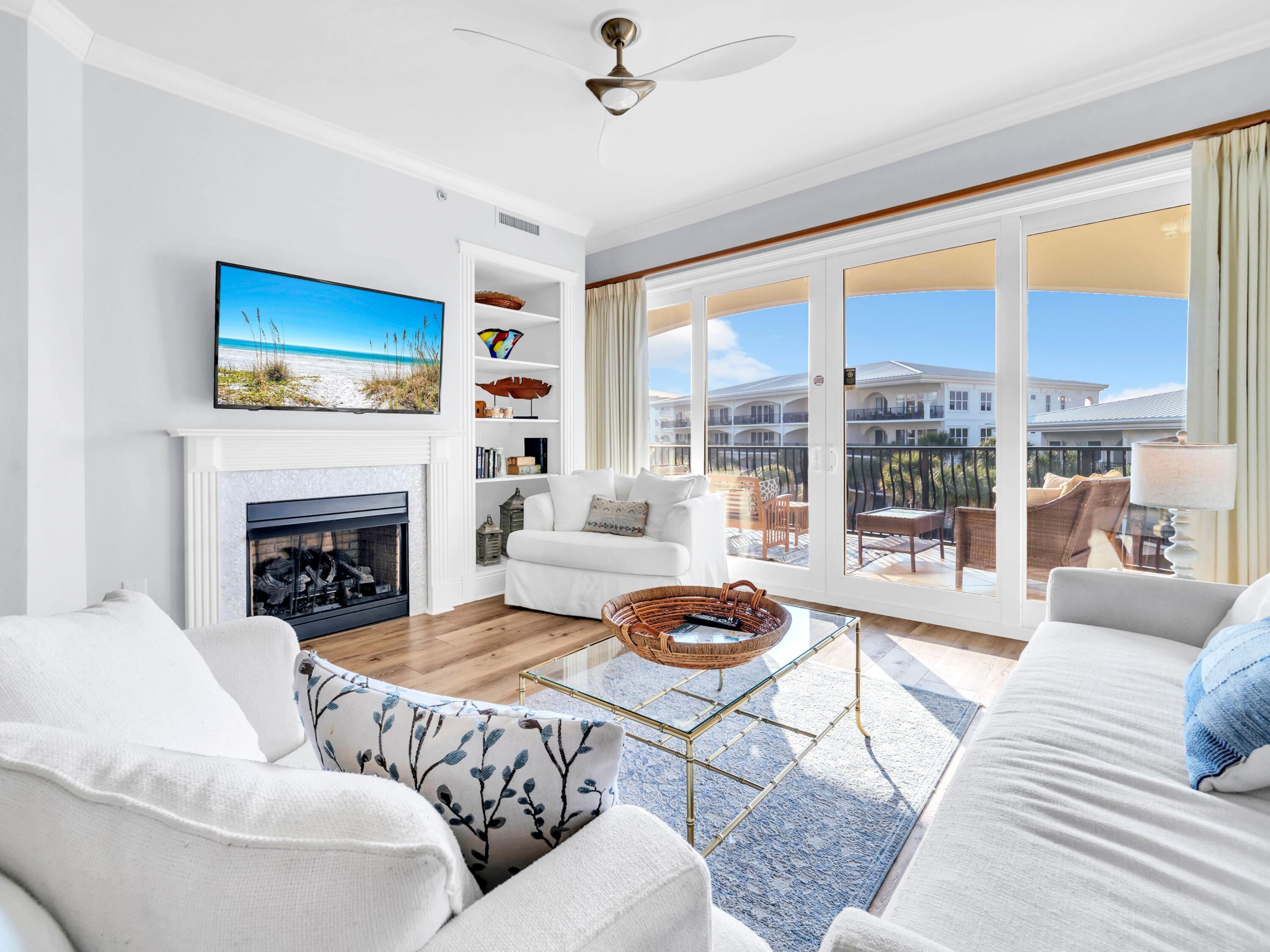Bonus, rare Gulf peek from this top floor balcony poolside unit!  Beautiful renovated residence on third floor includes deeded beach access/use in one of 30A's most sought-after luxury Gulf-front communities. This meticulously maintained 3-bedroom, 3-bath condo includes a hallway bunk for a fourth sleeping area and is poolside, offering easy access with a short stroll to the beach, fitness center, and hot tub. It boasts an open-concept layout with upscale finishes throughout, including updated luxury vinyl plank flooring, quartz countertops, lovely kitchen backsplash, new lighting, stunning bathroom tile & flooring. The kitchen counter was extended to enclose a drink fridge. The spacious master suite is features balcony access, a spa-inspired ensuite bath with a whirlpool tub, double vanities, plus a separate shower. Leave your car parked as you stroll or bike 30A on the path, to the health food store, bike shop, yoga studio, ice creamery, convenience store and many popular bistros and live music venues.  Blue Mountain is a popular laid back beach enclave boasting the highest elevation on entire Gulf of Mexico from Mexico to Miami!