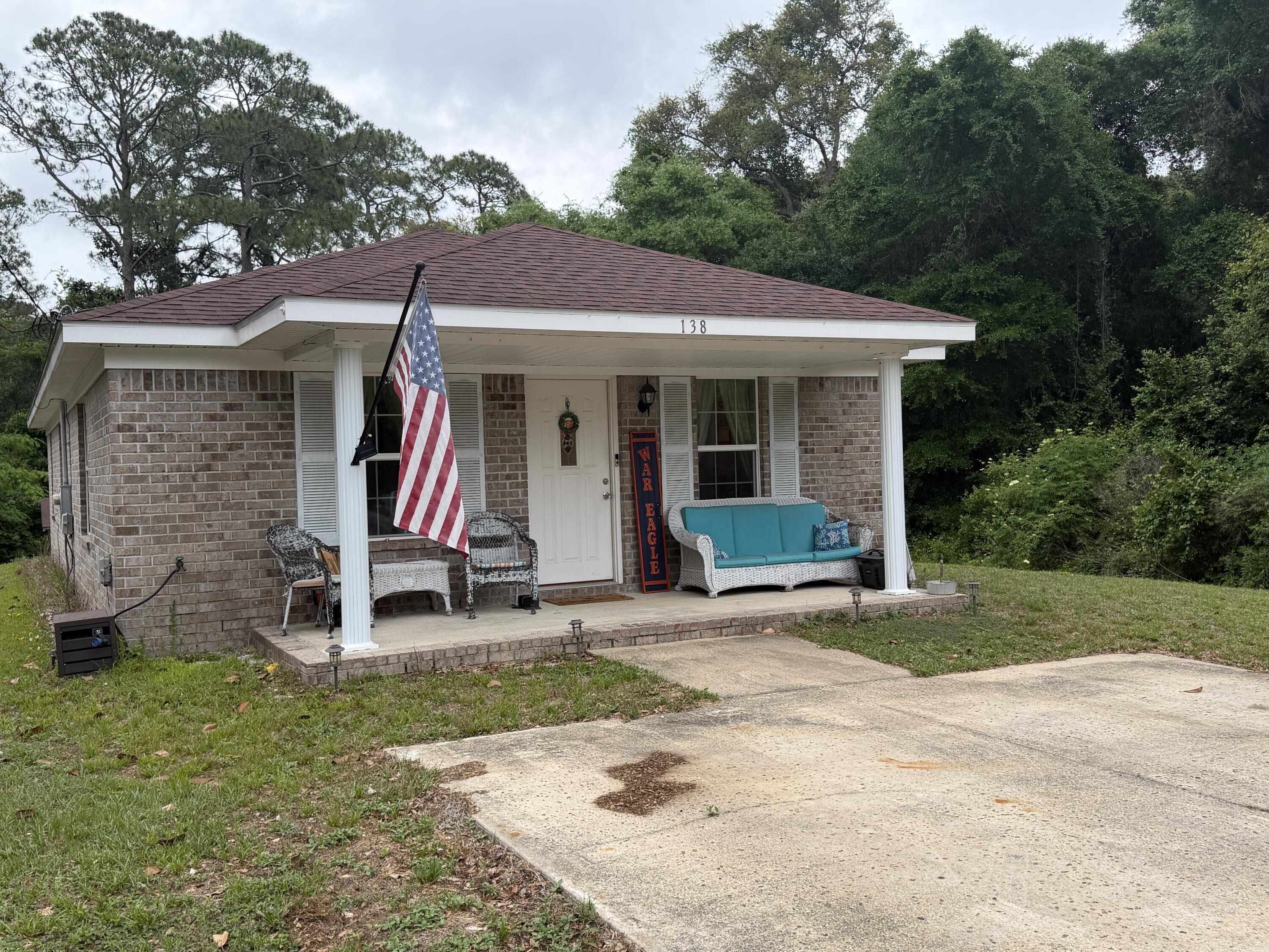 ***Move-In Special - $500.00 off the first month's rent***

Welcome to this well-maintained home centrally located in the heart of Niceville, built in 2017 and thoughtfully designed for comfortable modern living. Featuring tile flooring throughout and an open floor plan, this home offers a bright and spacious layout that is perfect for both everyday living and entertaining family and friends. The inviting living room flows seamlessly into the kitchen, which comes fully equipped with stainless steel appliances, ample space for cooking and gathering, complete with an island/breakfast bar and a formal dining area. 

The primary bedroom provides a relaxing retreat with dual closets and a private bathroom featuring a cultured marble shower. Two nicely sized guest bedrooms share a full guest bath. A bright and airy laundry room with a window adds convenience. 

Step outside to enjoy the charming front porch, an ideal spot for morning coffee or quiet evenings. Or enjoy your backyard, complete with spacious 20x20 workshop shed with electricity, perfect for storage, hobbies, or projects -- great added storage, and it has a covered porch. Situated on a corner lot, the property offers added privacy and a unique natural setting with an old trail just about 75 feet leading toward Swift Creek from the backyard. 

Pets may be considered with owner approval and a non-refundable pet fee. Please note this is a non-smoking property, and vaping is not permitted.