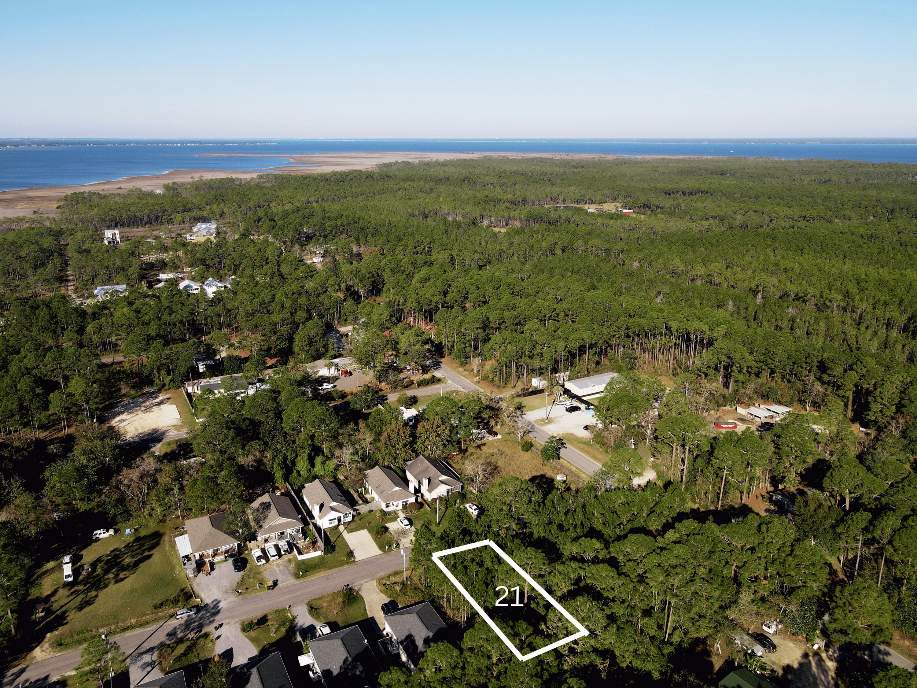 Positioned in a growing pocket of North Santa Rosa Beach, Lot 21 presents an excellent opportunity to build in a location that continues to see strong demand from both full-time residents and long-term renters. With close proximity to the Choctawhatchee Bay, Cessna Boat Landing, and everyday conveniences like shopping and dining, this homesite offers both lifestyle and investment appeal. Whether you're looking to build a primary residence, a second home, or hold for future value, this lot is a smart entry into one of South Walton's fastest-evolving areas. Additional land is available for purchase if a larger homesite is desired.