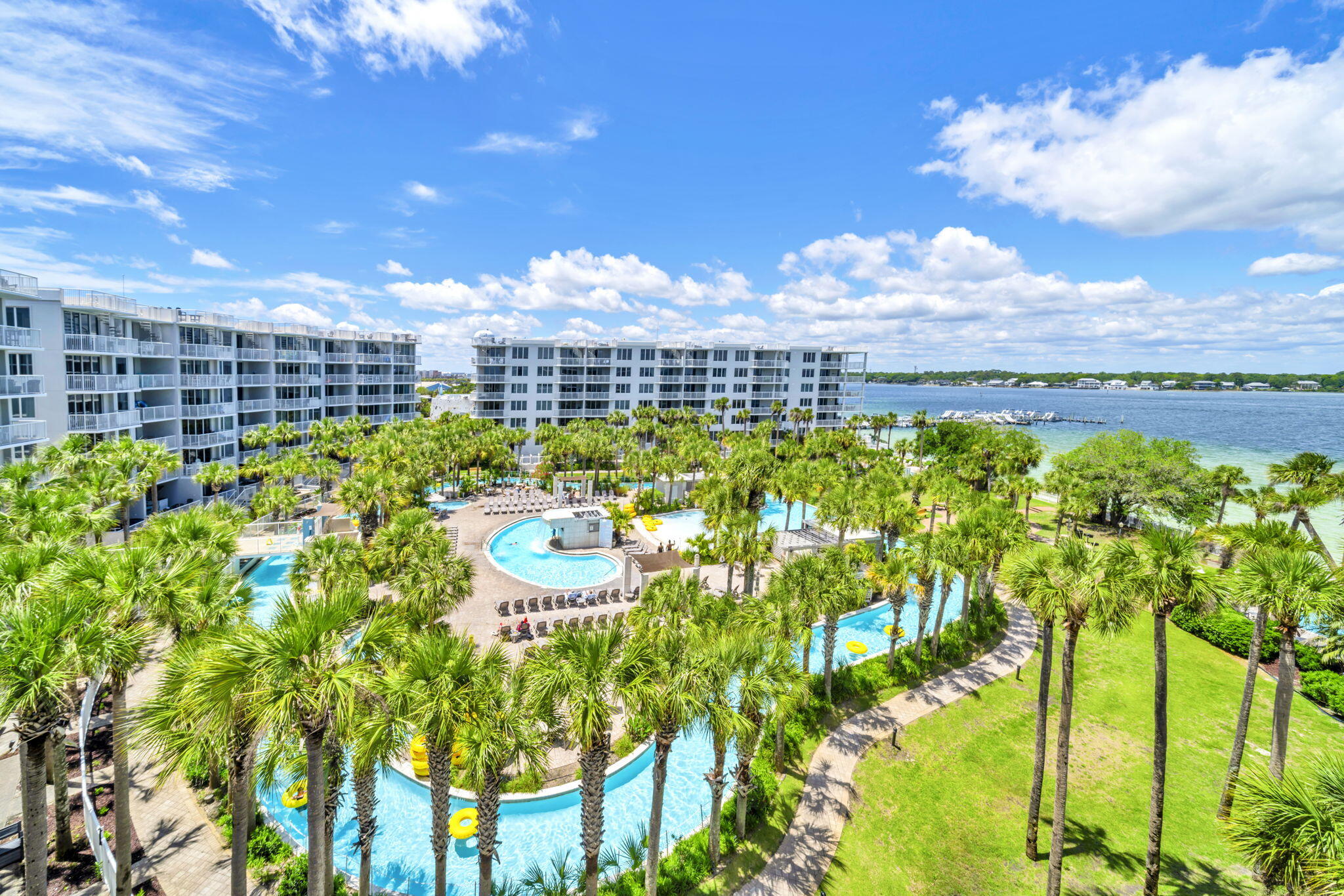This beautiful condo has a great view of the Bay and you can also see the Gulf.  Plenty of room for the whole family to make vacation memories and you can also cash in on vacation rentals.  The large wrap around balcony gives you the perfect setting for enjoying the views.  All the best amenities including beach access via the pedestrian bridge, covered parking, fitness center, and boat slips(sold separately).  Multiple pools including  lazy river,  zero entry and seasonally heated pools.  Many fun restaurants and attractions in the area.  Stylish and move in ready