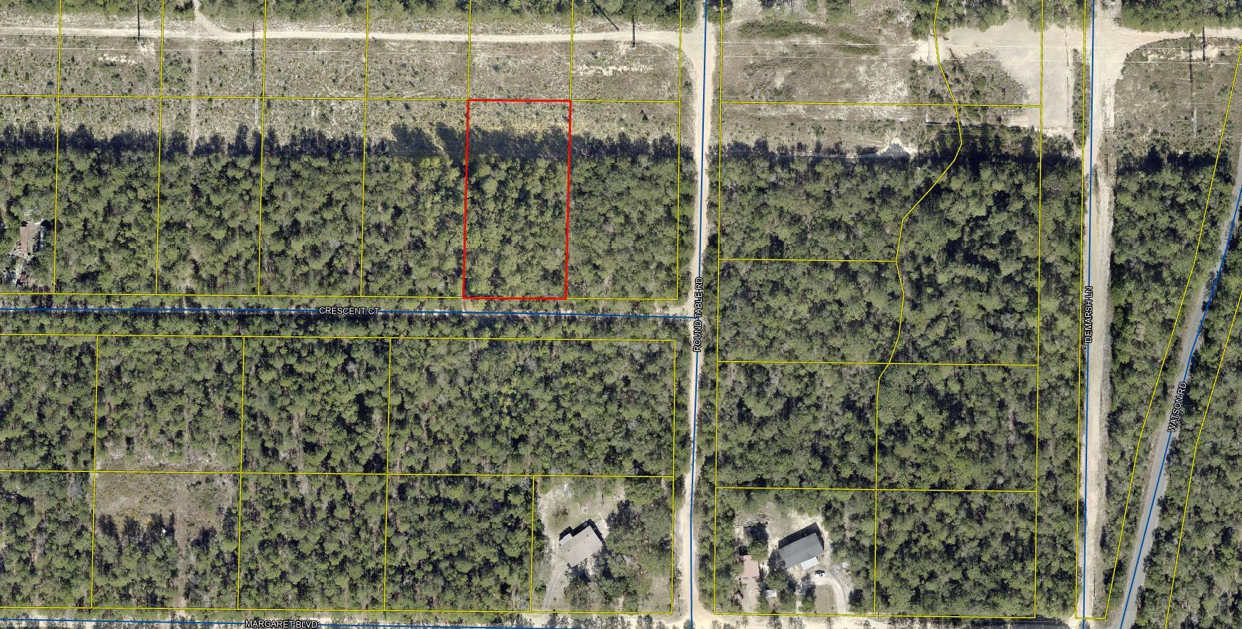 Partially wooded  .964 acre  lot in Unit 5 of Oakwood Hills, an area which is currently being developed and growing. Numerous distribution centers under development, such as Amazon. Zoning is Rural Residential / Rural Low Density which allows Single family residential and mobile homes  See photos for information PER the COUNTY GIS map for soils, flood zone , which is X, zoning, and other pertinent info. Set backs per county F 20 B 15 Sides 7 1/2 . The lot is raw , no tap in fees have been paid, septic needed. Seller has 6 lots total , all connected and available as a package deal