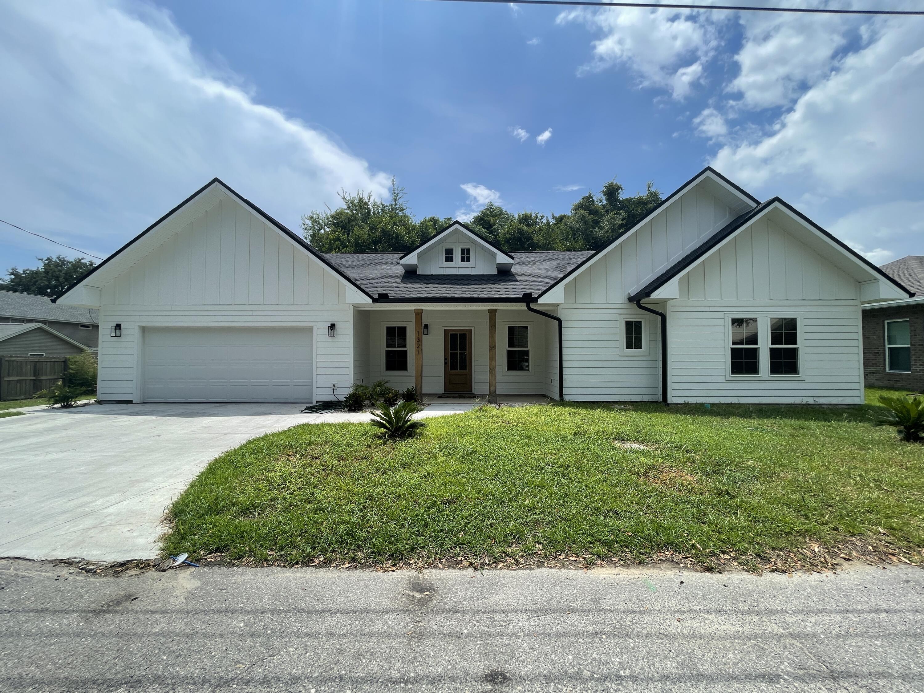 Welcome to this beautiful 3-bedroom, 2-bath home built in 2022, ideally located in the heart of Niceville. This thoughtfully designed property offers both comfort and convenience, with easy access to military bases, beaches, schools, shopping, dining, and more.

As you arrive, you're greeted by a charming covered front porch, perfect for relaxing. The home also features two spacious open patios, providing great outdoor living space, and lawn care is included in the rent for added ease. Inside, you'll find fresh neutral paint, durable luxury vinyl plank flooring, and a bright, open floor plan that creates an inviting atmosphere throughout. The large living room is enhanced by vaulted ceilings, offering a spacious and airy feel.  The kitchen is a true highlight, featuring stainless steel appliances, beautiful countertops, ample cabinetry with a stylish backsplash, a breakfast bar, a pantry, and a formal dining area--perfect for both everyday living and entertaining. The primary bedroom is generously sized and includes a walk-in closet and a private en suite with a double vanity and walk-in shower. Two additional guest bedrooms share a full bathroom, providing comfortable accommodations for family or visitors.

Pets may be considered on a case-by-case basis with prior owner approval and a non-refundable pet fee. This is a non-smoking property, and vaping is also prohibited, ensuring a clean and healthy living environment.