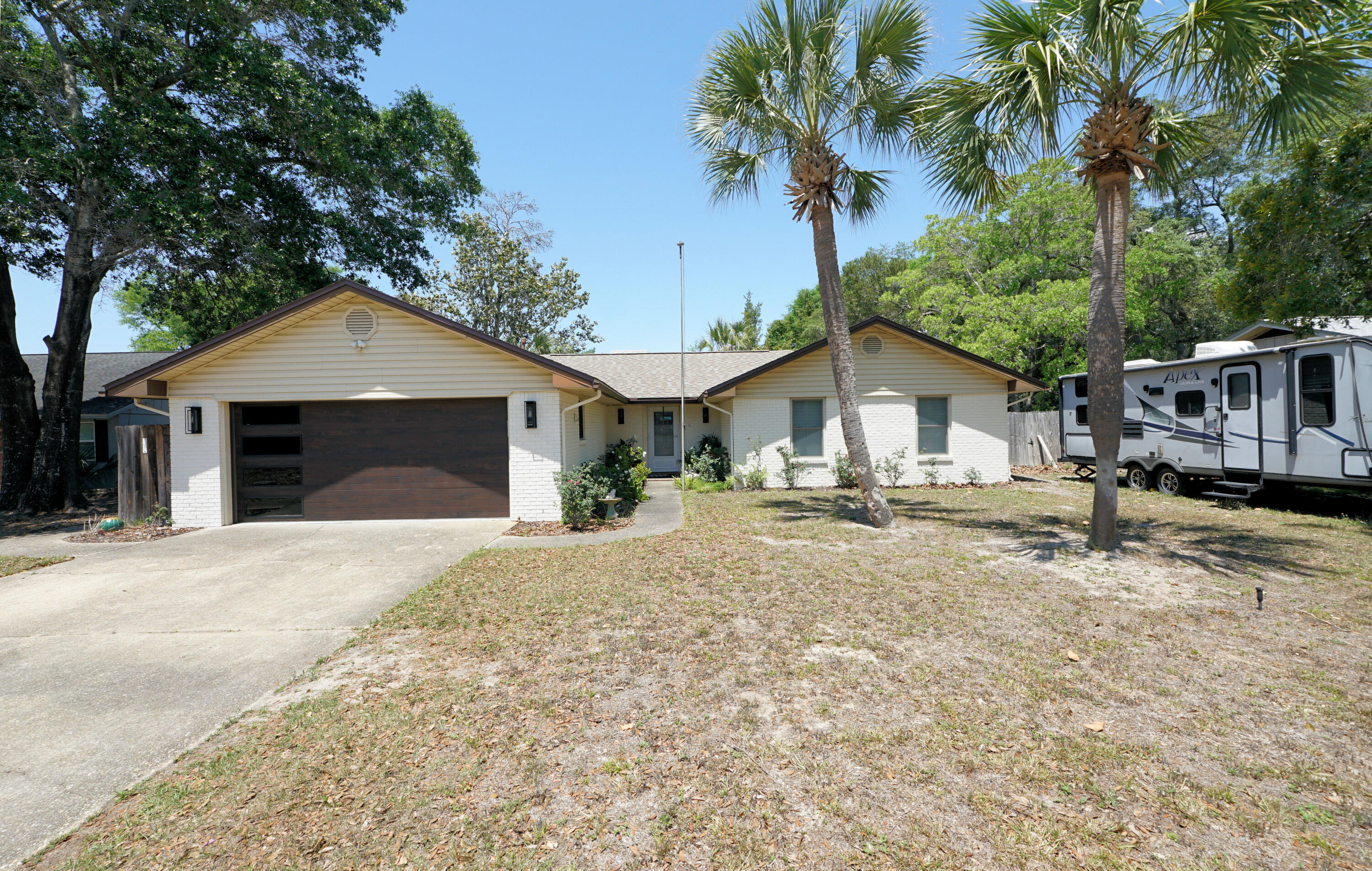 NO HOA, Inground saltwater POOL (10k gal)  and sundeck. New pavers around the pool. Updated Kitchen with Kitchenaid Gas stove and Dishwasher, new granite countertops in Kitchen.  Extra large openings to Dining Room and from DR to Den.  6'' baseboards.  New Kitchen Cabinets. Plantation shutters thru out.  Canned lights Kitchen and Living Room.  New Ceiling fans, Updated bathrooms with marble countertops.   New Carriage Lights beside the NEW garage door. There is a bonus shower/toilet and Stainless Mop sink in the garage, Great of working out or keeping the mess out after doing yard work. Two Storage buildings, one is a He/Shee shed, the other is sold As-Is and no value given. Professional Pics next week. Other documents and floor plans to follow.