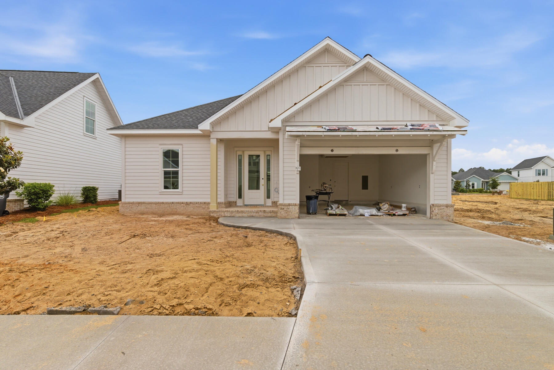 Welcome to the Alana II by Huff Homes, a 1,690 square foot single-level residence located in the Longleaf Park neighborhood of Watersound Origins, offering 2 bedrooms, 2 bathrooms, a dedicated study, and a 2-car garage.

Entering through the front porch, the foyer opens to a central living space with clear sightlines through the home. The living room connects directly to the dining area and kitchen, creating a continuous layout that extends to the screened rear porch. The kitchen includes a large island, quartz countertops, wood cabinetry with soft-close features, upgraded Bosch appliance package in stainless steel, vent hood, and a tiled backsplash.

The study is located just off the main living area toward the rear of the home, providing a defined workspace or flex room. The screened rear porch extends the living space outdoors and overlooks the backyard.

The primary suite is privately positioned at the rear left side of the home and includes a walk-in closet and a bathroom with a tiled shower, quartz dual vanity, and porcelain tile flooring. A secondary bedroom and full bathroom are located near the front of the home, offering separation for guests.

Additional interior features include 10-foot ceilings, 8-foot solid core interior doors, luxury vinyl plank flooring throughout the main living areas, recessed lighting, crown molding in the foyer, living, dining, and kitchen, and ceiling fans in all bedrooms and living spaces. The home also includes a dedicated laundry room, energy-efficient systems, and is pre-wired for home automation and security.

Exterior features include cement fiber siding, heirloom brick detailing at the front and rear porches, a screened rear porch, and professional landscaping package with irrigation.

Located within Watersound Origins, Longleaf Park provides access to community amenities including the Origins Golf Course, Village Commons pool and fitness center, and miles of walking and biking trails.