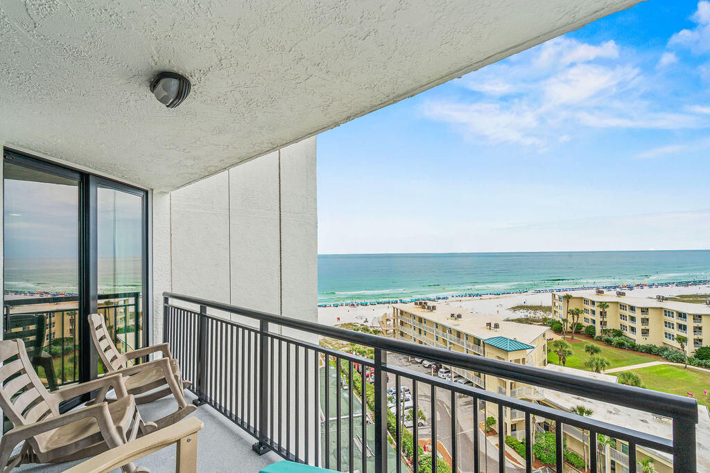 Wake up to VIEWs of one of Destin's most beautiful coastlines. Step onto your private balcony and let the salt air and shimmering emerald waters remind you why you fell in love with the Emerald Coast. Unit 1018 at Sundestin beach resort is a rare opportunity to own a direct beachfront retreat in one of Destin's most sought-after addresses -and it has never looked better.

The Sundestin complex has recently undergone extensive, top-to-bottom improvements, including: all-new impact-rated windows and sliding glass doors throughout the complex, full exterior waterproofing and fresh exterior paint, renovated balconies and railings, improvements to common areas new windows and doors, steel framing in trash chute, replaced trash chute, new boardwalk, etc- your sanctuary is solid, safe, and stunning. 

Best of all, the Sellers have paid the special assessments in FULL! -- meaning you step into ownership with deferred maintenance items taken care of. This unit delivers true peace of mind!

New Photos of the after-complex improvements, coming soon, updates include freshly painted exterior/interior, all new windows and doors and a coastal chic new round dining table and chairs. Perched on the 10th floor with sweeping, unobstructed west-facing sunset views, this beautifully appointed 2-bedroom, 2-bathroom condo is your front-row seat to Destin's legendary sunsets. Whether you're sipping coffee as dolphins glide past at sunrise or raising a glass as the sun melts into the horizon, every moment here feels like a postcard.

Inside, the coastal inspired interior is as stylish as the views are stunning. The mirrored subway tile backsplash catches the Gulf light and adds a touch of coastal glamour to the kitchen. The dining room is the perfect setting for family dinners around the new round dining table and chairs gives off coastal elegance while a gorgeous light fixture sits above the dining table and provides the perfect ambiance for evening meals. Shiplap brings warmth and coastal charm to the living space, and custom curtains and blinds throughout offer privacy.
With a freshly painted interior and offered fully furnished and decorated, to include appliances and kitchen essentials, this vacation rental investment is to convey completely turn-key.

ALL utilities are covered with the HOA dues to INCLUDE: power, water/sewer, tv/cable and internet service, trash, master association: management/legal, insurance, accounting, ground keeping, recreational facility, beach service and on-site security.

With direct beach access that includes beach service: umbrella and chairs for owners, resort-style amenities, pet-friendly, and a location in the heart of Destin's most beloved stretch of coastline, while being surrounded by the best of Destin's entertainment and attractions -Big Kahunas water park and and mini golf or go cart at The Track, -Sundestin Unit 1018 has the complete package: location is everything, turn-key, worry-free, resort style amenities and utterly breathtaking!

Life is better on the Gulf. This is your moment.