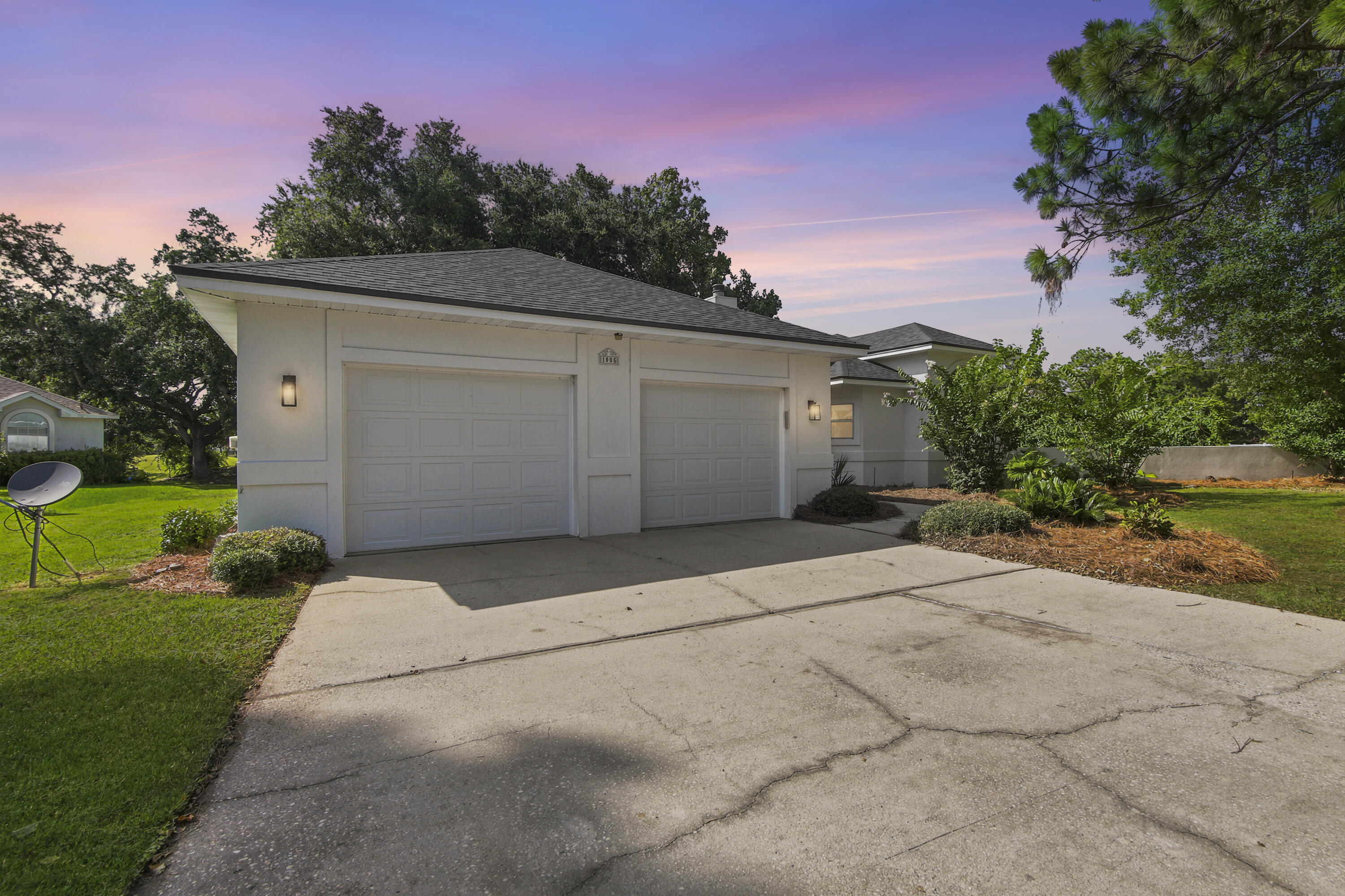 Welcome to 1005 Shalimar Pointe Drive, a beautifully updated home located on a quiet cul-de-sac in the gated Shalimar Pointe community. Situated directly on the Shalimar Pointe Golf Course, this 4-bedroom, 3-bath home offers approximately 2,625 square feet of living space with a functional single-level layout, an in-ground gunite pool with new equipment, and numerous recent improvements. Updates include a new roof, HVAC system, flooring, granite countertops, appliances, fixtures, vanities, exterior and garage doors, landscaping and refreshed stucco, creating a move-in ready home. Conveniently located near Eglin Air Force Base, local shopping, dining, schools, and just a short drive to the Emerald Coast's white-sand beaches, this home combines a desirable location with thoughtful updates. Don't miss your opportunity to see everything this property has to offer. Call and schedule your showing today!