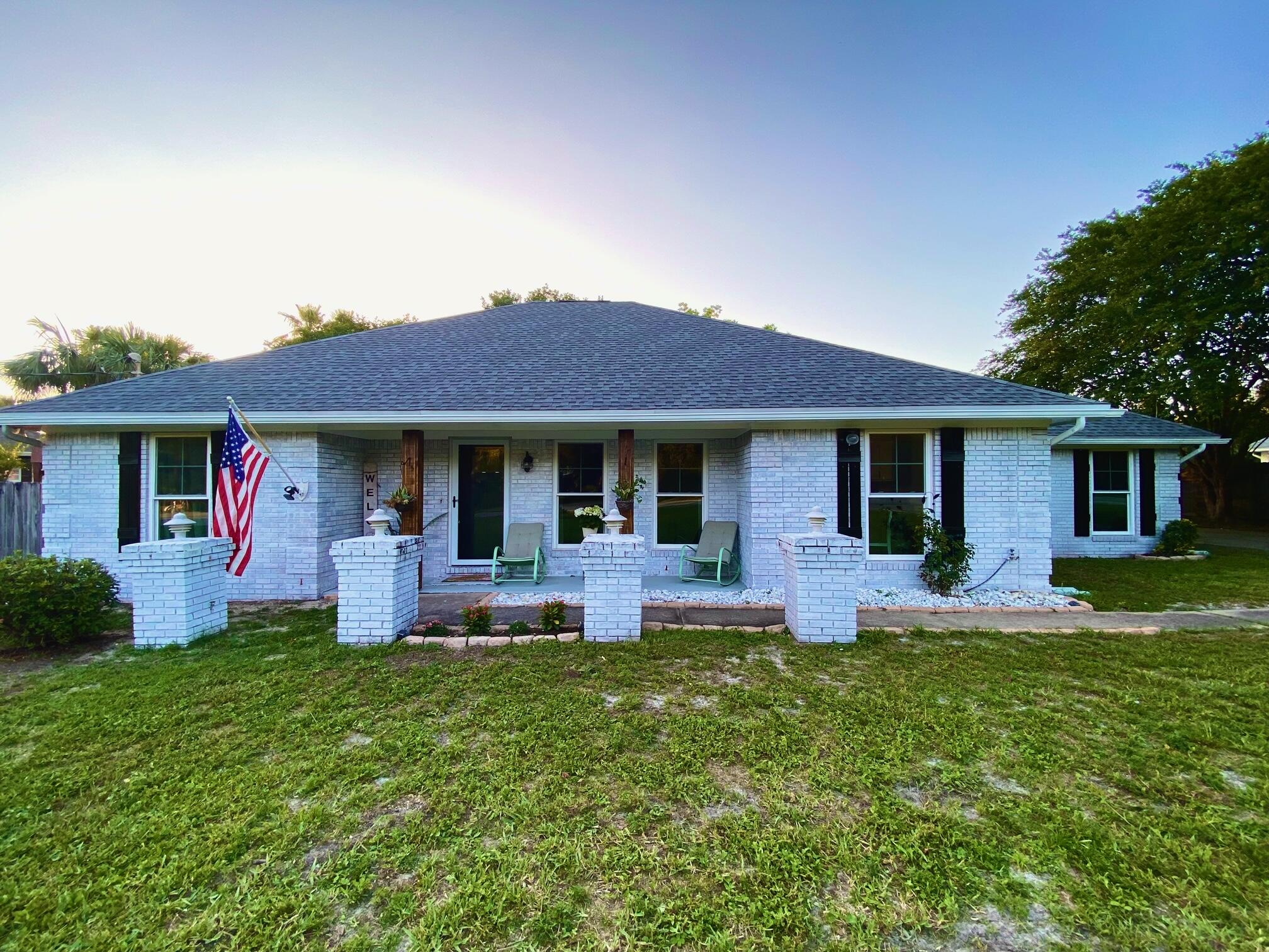 Welcome home to this beautifully remodeled brick residence located in a peaceful neighborhood with private beach access to the Santa Rosa Sound. Offering the perfect combination of comfort, space, and convenience, this home is ideally situated with easy access to military bases, schools, shopping, dining, and local attractions.

Step inside to discover a spacious 3-bedroom, 2-bathroom floor plan designed for comfortable living. The impressive primary suite serves as a private retreat, featuring oversized closets, a separate water closet, dual vanities, a relaxing whirlpool tub, and a separate shower.

Two generously sized guest bedrooms share a full bathroom, providing plenty of space for family members or guests.

The well-appointed kitchen offers a cozy breakfast nook for casual dining, along with a breakfast bar that provides additional seating and entertaining space. For more formal occasions, enjoy the separate dining room, perfect for hosting family dinners and holiday gatherings.

The inviting living room features a decorative stone fireplace and direct access to the backyard, creating a warm and welcoming atmosphere for relaxing or entertaining.

Outdoor enthusiasts will appreciate the ample parking space available for a boat or RV, making it easy to enjoy all the recreational opportunities the area has to offer.

Pet-friendly on a case-by-case basis with owner approval and a non-refundable pet fee.

No smoking permitted, including vaping.
 This exceptional property combines coastal living, modern updates, and plenty of space both inside and out. Don't miss the opportunity to make this beautiful home your next residence!