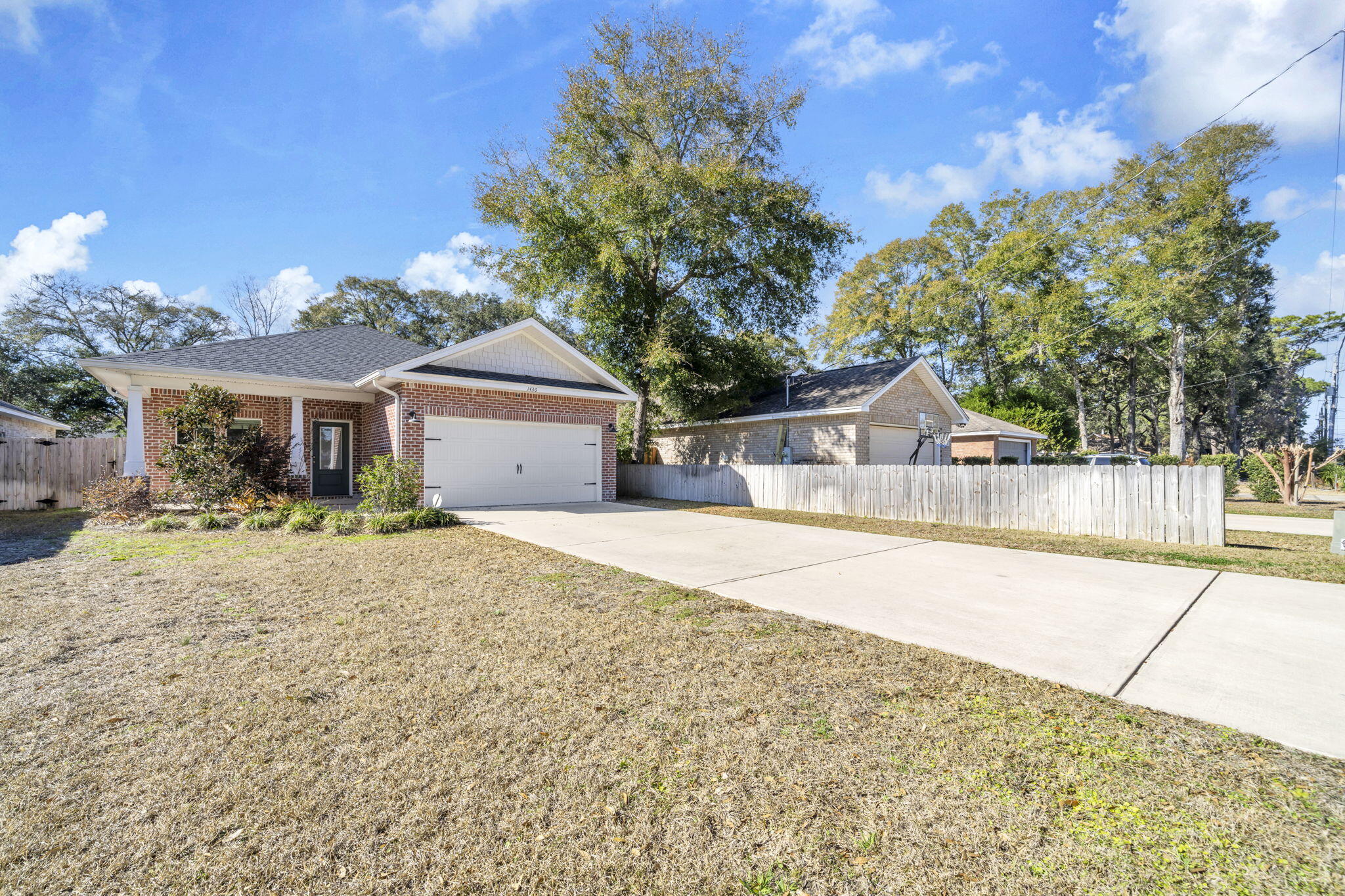 PCS Special! VA assumable! This 2023 4-side brick build sits on a large level lot and offers a perfect combination of classic elegance and modern convenience. The location is in the heart of the Bluewater area in Niceville. The open living space is plenty spacious for entertaining with Quartz counter-tops, custom cabinetry, and stainless GE appliances. The architecture reveals arched entry ways, crown molding, tray ceilings, and recessed lighting throughout the home. The home shines with LVP flooring throughout each room. The guest rooms are handsomely sized with walk-in closets. The master bedroom takes the cake with an oversized glass shower, dual vanities, and upgraded hardware. The master has a large walk-in closet with plenty of storage and shelving. The large lot has plenty of space for activities. The large privacy fenced backyard has ample space for entertaining, kids activities, or even a pool! Come see it today!