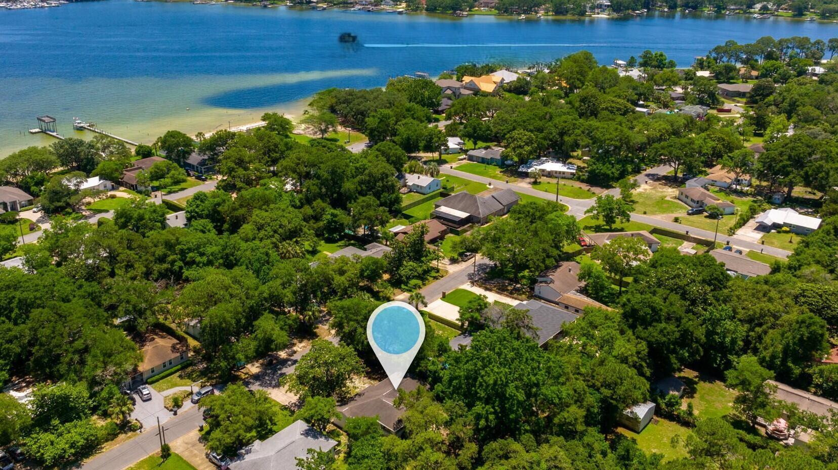 Tucked into a quiet Fort Walton Beach neighborhood, this 1950s home has been thoughtfully renovated to blend its original coastal charm with the updates today's buyers actually want. Walk in and you'll find a stylish kitchen, new flooring, and fresh finishes throughout -- the kind of turn-key condition that lets you move in or start renting right away.

Location is hard to beat: the neighborhood park with bay beach access, picnic areas, a playground, and a small boat launch is just minutes away, and you're minutes from local shops and restaurants. The Gulf Coast's famous white-sand beaches are a short drive away too.

This one's especially interesting for investors. The home has a track record as a successful short-term rental to DOD contractors and traveling nurses, which means steady, year-round demand rather than just a seasonal bump. Recent upgrades make it low-maintenance from day one: HVAC (2022/2023), a new metal roof (2024), water heater (2025), plus updated flooring, paint, and finishes, along with newly added attic insulation for better year-round comfort.

Whether you're looking for a primary residence with character or an income property with proven rental history, this one's worth a look.

Owner is a licensed real estate agent in Tennessee. Buyer is responsible for independently verifying all data, including lot and room dimensions.