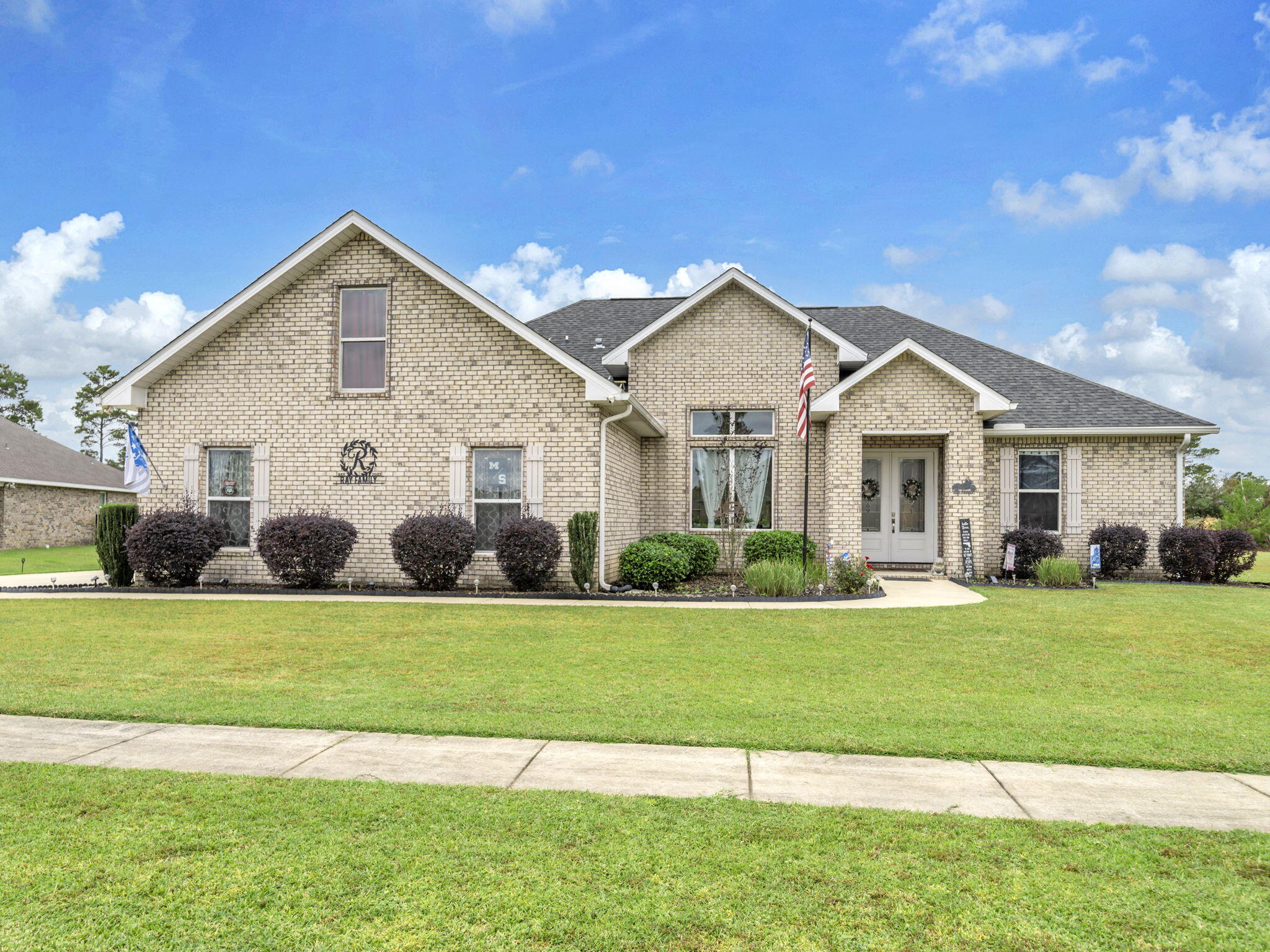 Seller now offering $10,000 towards closing costs or rate buy-down! Live the Florida lifestyle in Windswept Estates! This custom 4BR/2BA home sits on a .64-acre lot and offers a gourmet kitchen with stainless steel appliances,  custom cabinetry, a large quartz island, and a new refrigerator & microwave (2025). Spa-inspired primary suite with an oversized tiled shower and a huge walk-in closet that feels like a boutique.  The main living areas have new luxury vinyl plank flooring. Outside, you will find a covered porch with a spa for ultimate relaxation, your personal retreat after a long day. Windswept Dunes offers resort-style living with a pool, golf, and clubhouse. Engineered with premium materials for peace of mind: 5/8" rebar foundation, 3000 psi concrete, 2x6 exterior walls, Hurricane straps, hangers, and all-thread reinforcements. Oversized 2-car garage plus attic storage for all your gear, hobbies, and holiday décor.  Complete sprinkler system with a new pump (2025) keeping your lawn lush and green with zero hassle. Expansive backyard with endless potential: garden, pool, outdoor kitchen, you name it. Just 5 miles to the new Publix shopping center in Freeport. Only 35 minutes to Blue Mountain Beach and Scenic Highway 30A. This move-in-ready home offers a rare opportunity to enjoy high-quality construction, modern comfort, and a peaceful setting all within reach of the Emerald Coast.